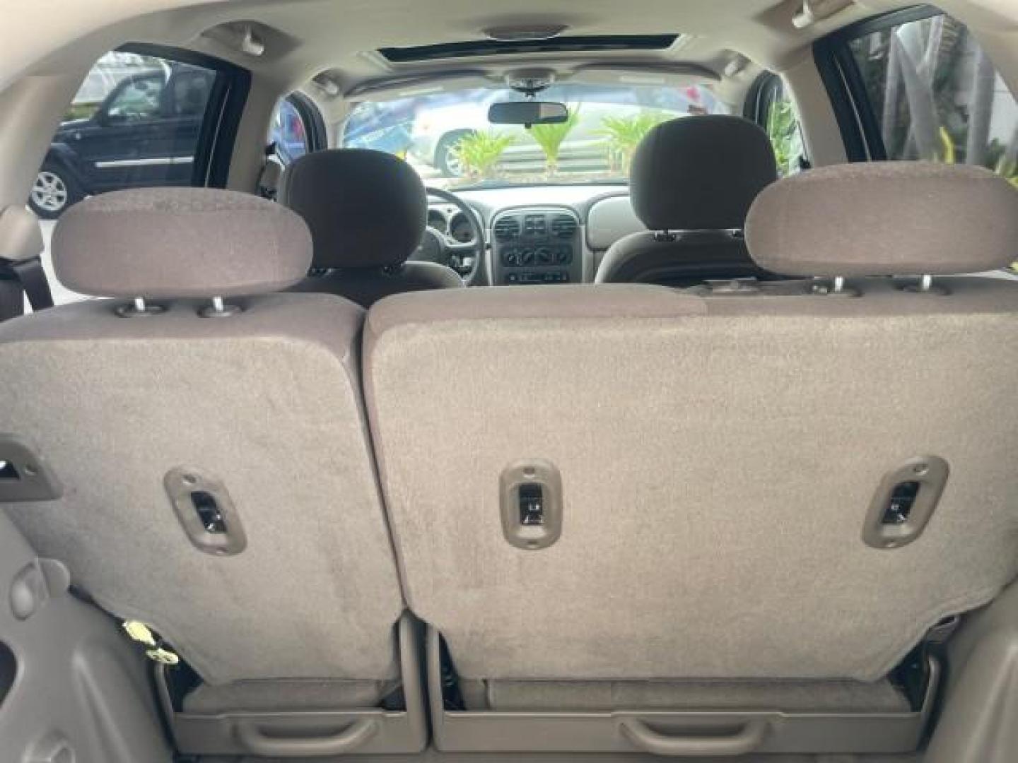 2004 Cool Vanilla /Dark Slate Gray Chrysler PT Cruiser Touring LOW MILES 46,180 (3C4FY58B34T) with an 2.4L 4-Cyl Engine engine, Automatic transmission, located at 4701 North Dixie Hwy, Pompano Beach, FL, 33064, (954) 422-2889, 26.240938, -80.123474 - OUR WEBPAGE FLORIDACARS1.COM HAS OVER 100 PHOTOS AND FREE CARFAX LINK 2004 CHRYSLER PT CRUISER TOURING EDITION VIN: 3C4FY58B34T209277 3 C 4 F Y 5 8 B 3 4 T 2 0 9 2 7 7 VAN 2.4L I4 F DOHC 16V GASOLINE 29 MPG FRONT WHEEL DRIVE Features Air Conditioning Alloy Wheels AM/FM Stereo Automatic Transmission - Photo#91