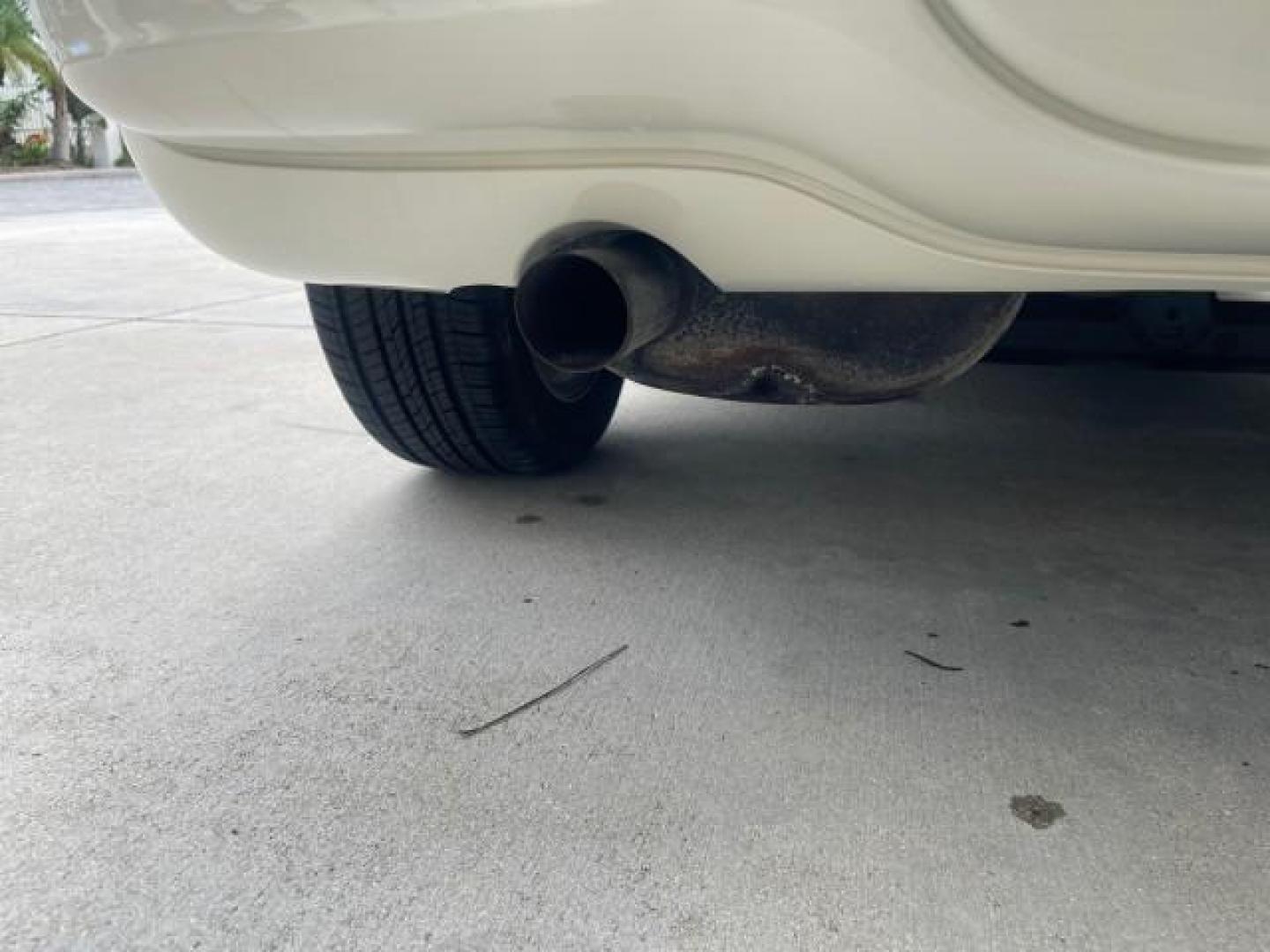 2004 Cool Vanilla /Dark Slate Gray Chrysler PT Cruiser Touring LOW MILES 46,180 (3C4FY58B34T) with an 2.4L 4-Cyl Engine engine, Automatic transmission, located at 4701 North Dixie Hwy, Pompano Beach, FL, 33064, (954) 422-2889, 26.240938, -80.123474 - OUR WEBPAGE FLORIDACARS1.COM HAS OVER 100 PHOTOS AND FREE CARFAX LINK 2004 CHRYSLER PT CRUISER TOURING EDITION VIN: 3C4FY58B34T209277 3 C 4 F Y 5 8 B 3 4 T 2 0 9 2 7 7 VAN 2.4L I4 F DOHC 16V GASOLINE 29 MPG FRONT WHEEL DRIVE Features Air Conditioning Alloy Wheels AM/FM Stereo Automatic Transmission - Photo#92