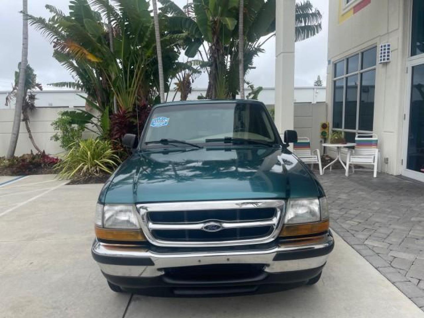 1998 Deep Emerald Green (CC/Met) /Medium Graphite Ford Ranger XL LOW MILES 4 CYL LOW MILES (1FTYR10C0WP) with an 2.5L EFI 4-Cyl Engine engine, Automatic transmission, located at 4701 North Dixie Hwy, Pompano Beach, FL, 33064, (954) 422-2889, 26.240938, -80.123474 - OUR WEBPAGE FLORIDACARS1.COM HAS OVER 100 PHOTOS AND FREE CARFAX LINK 1998 FORD RANGER SPLASH FLARESIDE VIN: 1FTYR10C0WPA84443 1 F T Y R 1 0 C 0 W P A 8 4 4 4 3 PICKUP 2.5L I4 F SOHC 8V GASOLINE 27 MPG REAR WHEEL DRIVE Features ABS Brakes Automatic Transmission Cassette Player Cloth Seats Ice Cold A - Photo#2