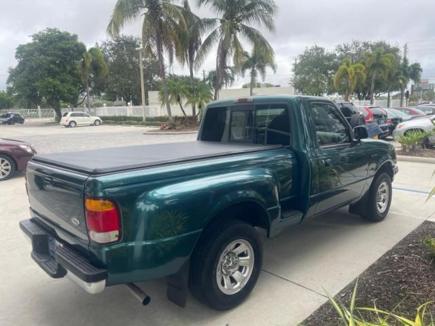 1998 Deep Emerald Green (CC/Met) /Medium Graphite Ford Ranger XL LOW MILES 4 CYL LOW MILES (1FTYR10C0WP) with an 2.5L EFI 4-Cyl Engine engine, Automatic transmission, located at 4701 North Dixie Hwy, Pompano Beach, FL, 33064, (954) 422-2889, 26.240938, -80.123474 - OUR WEBPAGE FLORIDACARS1.COM HAS OVER 100 PHOTOS AND FREE CARFAX LINK 1998 FORD RANGER SPLASH FLARESIDE VIN: 1FTYR10C0WPA84443 1 F T Y R 1 0 C 0 W P A 8 4 4 4 3 PICKUP 2.5L I4 F SOHC 8V GASOLINE 27 MPG REAR WHEEL DRIVE Features ABS Brakes Automatic Transmission Cassette Player Cloth Seats Ice Cold A - Photo#7