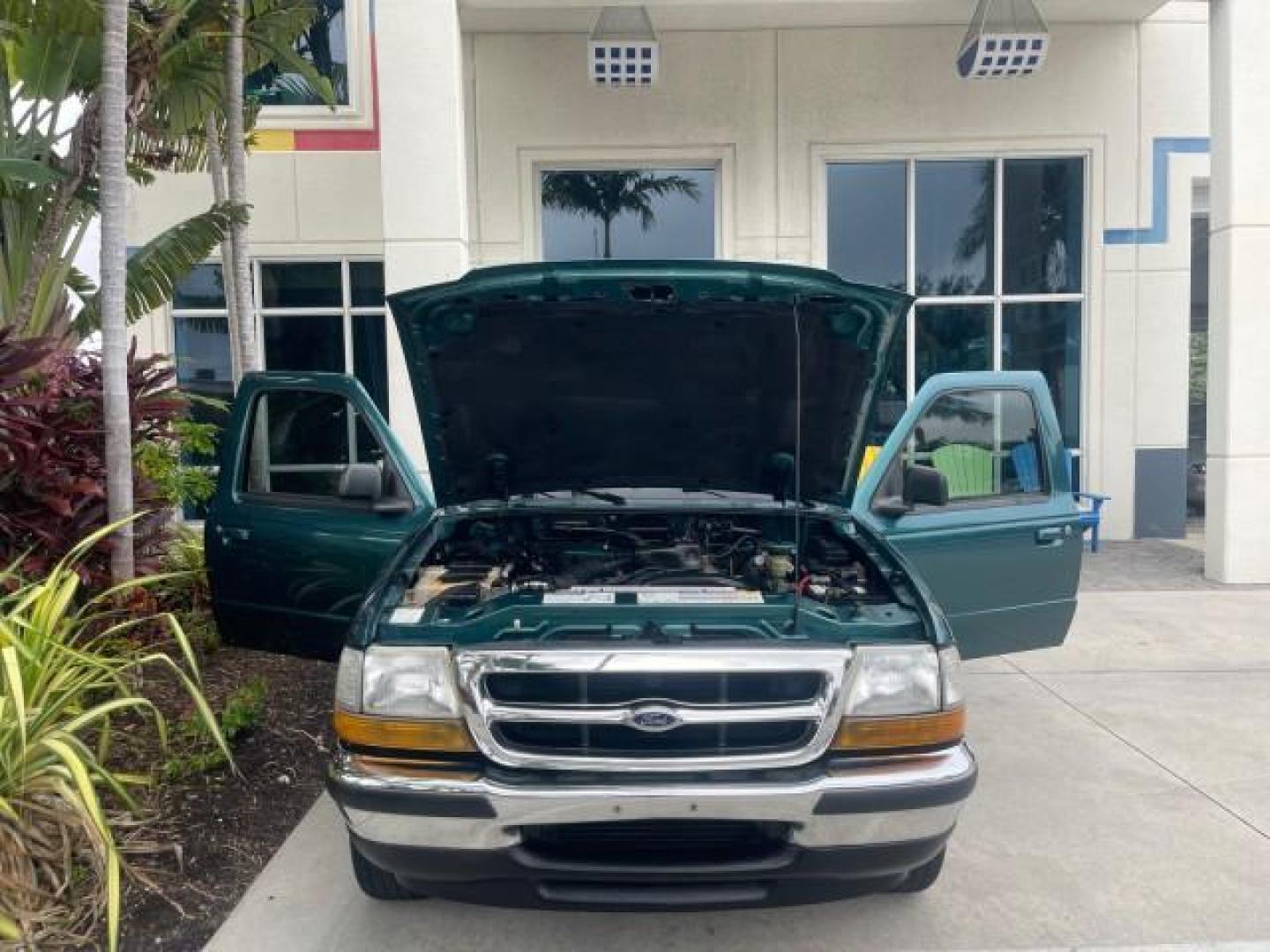 1998 Deep Emerald Green (CC/Met) /Medium Graphite Ford Ranger XL LOW MILES 4 CYL LOW MILES (1FTYR10C0WP) with an 2.5L EFI 4-Cyl Engine engine, Automatic transmission, located at 4701 North Dixie Hwy, Pompano Beach, FL, 33064, (954) 422-2889, 26.240938, -80.123474 - OUR WEBPAGE FLORIDACARS1.COM HAS OVER 100 PHOTOS AND FREE CARFAX LINK 1998 FORD RANGER SPLASH FLARESIDE VIN: 1FTYR10C0WPA84443 1 F T Y R 1 0 C 0 W P A 8 4 4 4 3 PICKUP 2.5L I4 F SOHC 8V GASOLINE 27 MPG REAR WHEEL DRIVE Features ABS Brakes Automatic Transmission Cassette Player Cloth Seats Ice Cold A - Photo#17