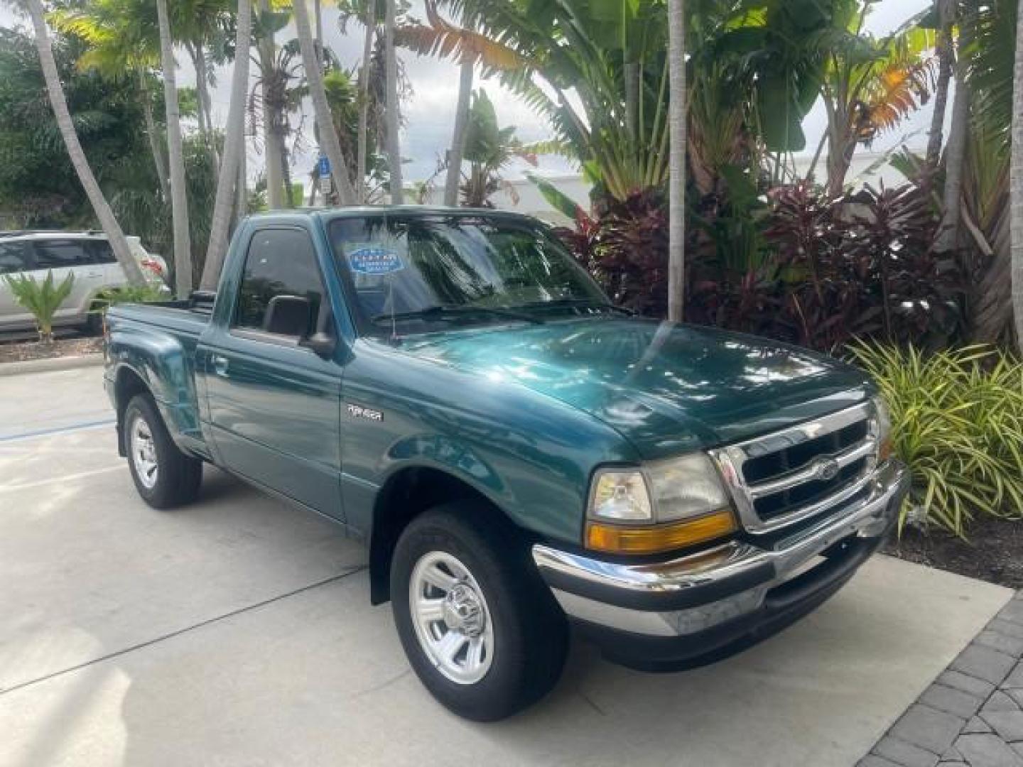 1998 Deep Emerald Green (CC/Met) /Medium Graphite Ford Ranger XL LOW MILES 4 CYL LOW MILES (1FTYR10C0WP) with an 2.5L EFI 4-Cyl Engine engine, Automatic transmission, located at 4701 North Dixie Hwy, Pompano Beach, FL, 33064, (954) 422-2889, 26.240938, -80.123474 - OUR WEBPAGE FLORIDACARS1.COM HAS OVER 100 PHOTOS AND FREE CARFAX LINK 1998 FORD RANGER SPLASH FLARESIDE VIN: 1FTYR10C0WPA84443 1 F T Y R 1 0 C 0 W P A 8 4 4 4 3 PICKUP 2.5L I4 F SOHC 8V GASOLINE 27 MPG REAR WHEEL DRIVE Features ABS Brakes Automatic Transmission Cassette Player Cloth Seats Ice Cold A - Photo#24