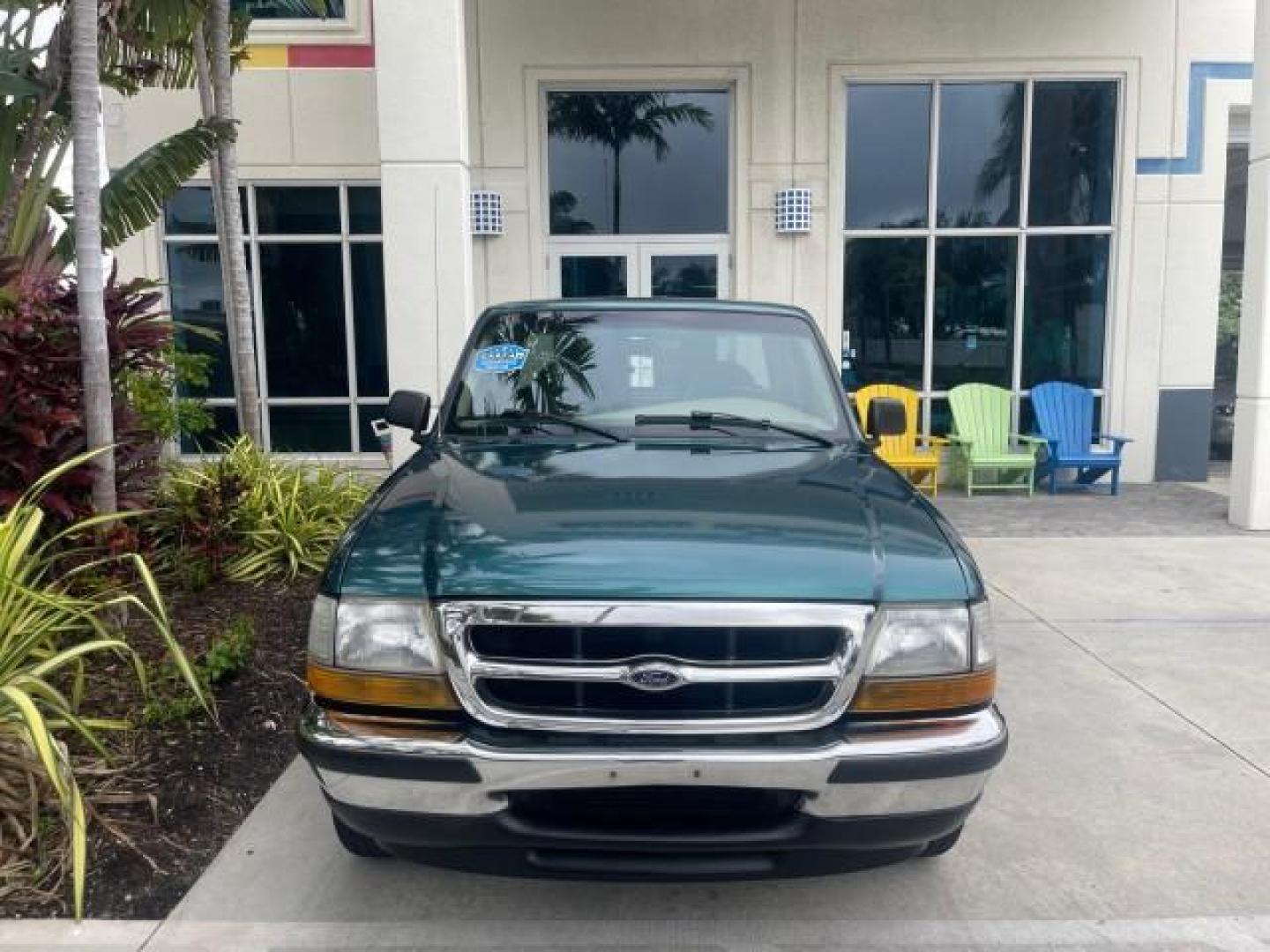 1998 Deep Emerald Green (CC/Met) /Medium Graphite Ford Ranger XL LOW MILES 4 CYL LOW MILES (1FTYR10C0WP) with an 2.5L EFI 4-Cyl Engine engine, Automatic transmission, located at 4701 North Dixie Hwy, Pompano Beach, FL, 33064, (954) 422-2889, 26.240938, -80.123474 - OUR WEBPAGE FLORIDACARS1.COM HAS OVER 100 PHOTOS AND FREE CARFAX LINK 1998 FORD RANGER SPLASH FLARESIDE VIN: 1FTYR10C0WPA84443 1 F T Y R 1 0 C 0 W P A 8 4 4 4 3 PICKUP 2.5L I4 F SOHC 8V GASOLINE 27 MPG REAR WHEEL DRIVE Features ABS Brakes Automatic Transmission Cassette Player Cloth Seats Ice Cold A - Photo#28