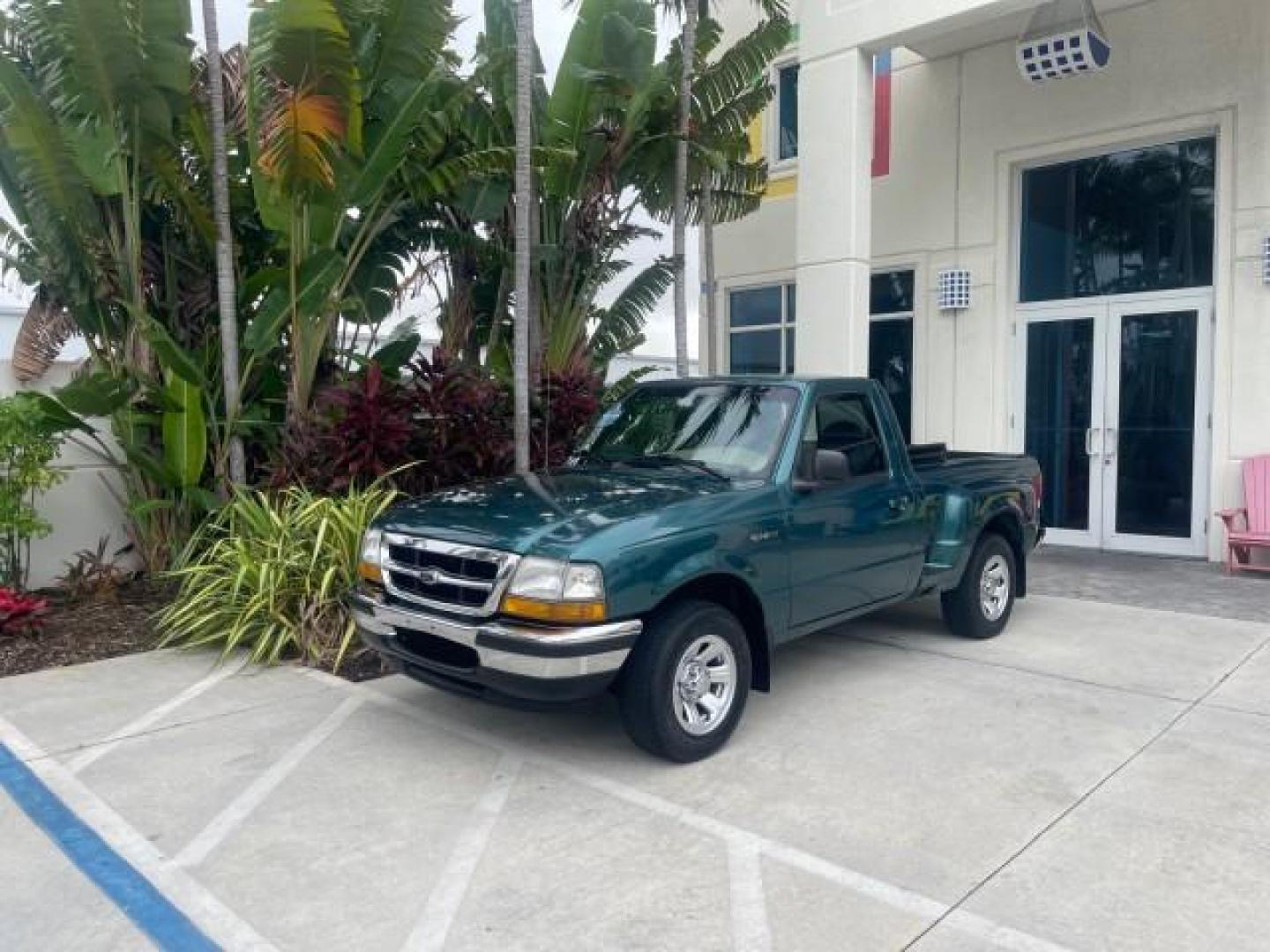 1998 Deep Emerald Green (CC/Met) /Medium Graphite Ford Ranger XL LOW MILES 4 CYL LOW MILES (1FTYR10C0WP) with an 2.5L EFI 4-Cyl Engine engine, Automatic transmission, located at 4701 North Dixie Hwy, Pompano Beach, FL, 33064, (954) 422-2889, 26.240938, -80.123474 - OUR WEBPAGE FLORIDACARS1.COM HAS OVER 100 PHOTOS AND FREE CARFAX LINK 1998 FORD RANGER SPLASH FLARESIDE VIN: 1FTYR10C0WPA84443 1 F T Y R 1 0 C 0 W P A 8 4 4 4 3 PICKUP 2.5L I4 F SOHC 8V GASOLINE 27 MPG REAR WHEEL DRIVE Features ABS Brakes Automatic Transmission Cassette Player Cloth Seats Ice Cold A - Photo#29