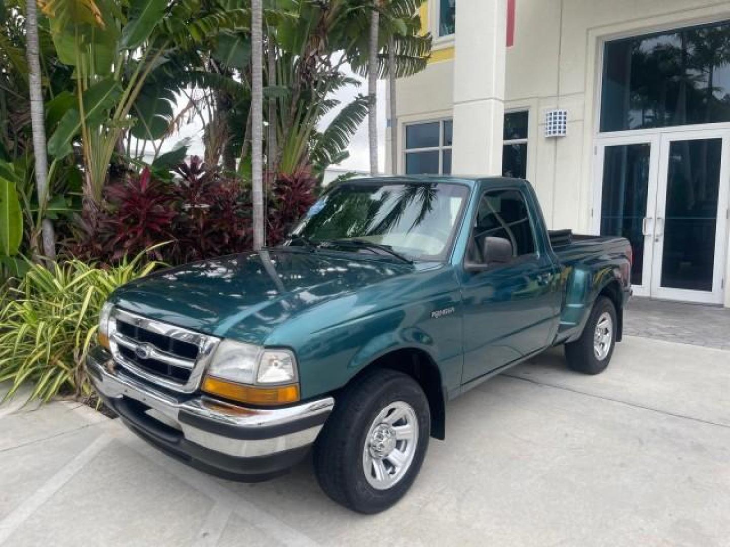 1998 Deep Emerald Green (CC/Met) /Medium Graphite Ford Ranger XL LOW MILES 4 CYL LOW MILES (1FTYR10C0WP) with an 2.5L EFI 4-Cyl Engine engine, Automatic transmission, located at 4701 North Dixie Hwy, Pompano Beach, FL, 33064, (954) 422-2889, 26.240938, -80.123474 - OUR WEBPAGE FLORIDACARS1.COM HAS OVER 100 PHOTOS AND FREE CARFAX LINK 1998 FORD RANGER SPLASH FLARESIDE VIN: 1FTYR10C0WPA84443 1 F T Y R 1 0 C 0 W P A 8 4 4 4 3 PICKUP 2.5L I4 F SOHC 8V GASOLINE 27 MPG REAR WHEEL DRIVE Features ABS Brakes Automatic Transmission Cassette Player Cloth Seats Ice Cold A - Photo#30