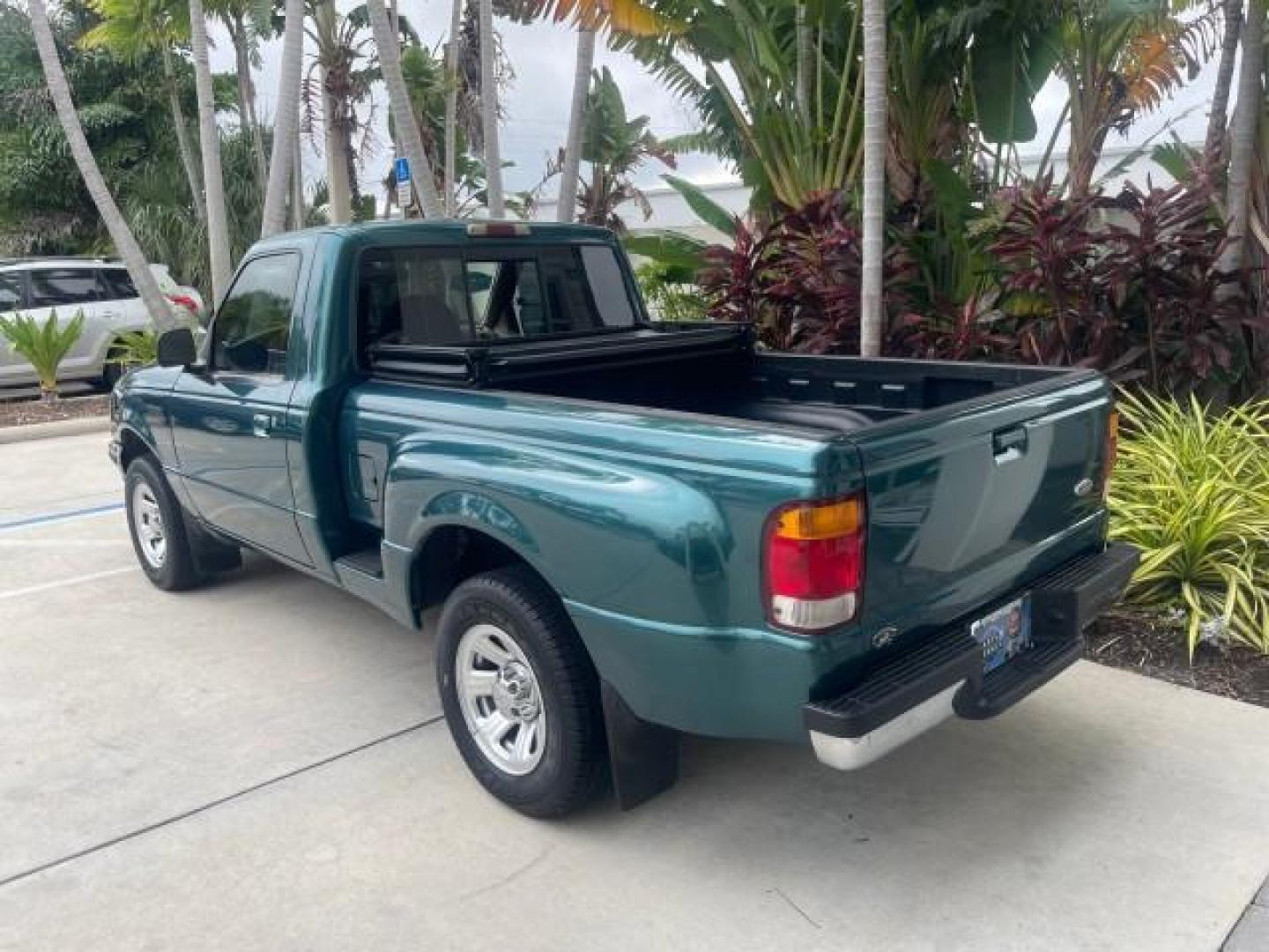 1998 Deep Emerald Green (CC/Met) /Medium Graphite Ford Ranger XL LOW MILES 4 CYL LOW MILES (1FTYR10C0WP) with an 2.5L EFI 4-Cyl Engine engine, Automatic transmission, located at 4701 North Dixie Hwy, Pompano Beach, FL, 33064, (954) 422-2889, 26.240938, -80.123474 - OUR WEBPAGE FLORIDACARS1.COM HAS OVER 100 PHOTOS AND FREE CARFAX LINK 1998 FORD RANGER SPLASH FLARESIDE VIN: 1FTYR10C0WPA84443 1 F T Y R 1 0 C 0 W P A 8 4 4 4 3 PICKUP 2.5L I4 F SOHC 8V GASOLINE 27 MPG REAR WHEEL DRIVE Features ABS Brakes Automatic Transmission Cassette Player Cloth Seats Ice Cold A - Photo#34