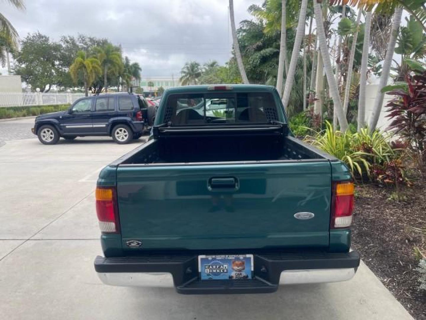 1998 Deep Emerald Green (CC/Met) /Medium Graphite Ford Ranger XL LOW MILES 4 CYL LOW MILES (1FTYR10C0WP) with an 2.5L EFI 4-Cyl Engine engine, Automatic transmission, located at 4701 North Dixie Hwy, Pompano Beach, FL, 33064, (954) 422-2889, 26.240938, -80.123474 - OUR WEBPAGE FLORIDACARS1.COM HAS OVER 100 PHOTOS AND FREE CARFAX LINK 1998 FORD RANGER SPLASH FLARESIDE VIN: 1FTYR10C0WPA84443 1 F T Y R 1 0 C 0 W P A 8 4 4 4 3 PICKUP 2.5L I4 F SOHC 8V GASOLINE 27 MPG REAR WHEEL DRIVE Features ABS Brakes Automatic Transmission Cassette Player Cloth Seats Ice Cold A - Photo#36