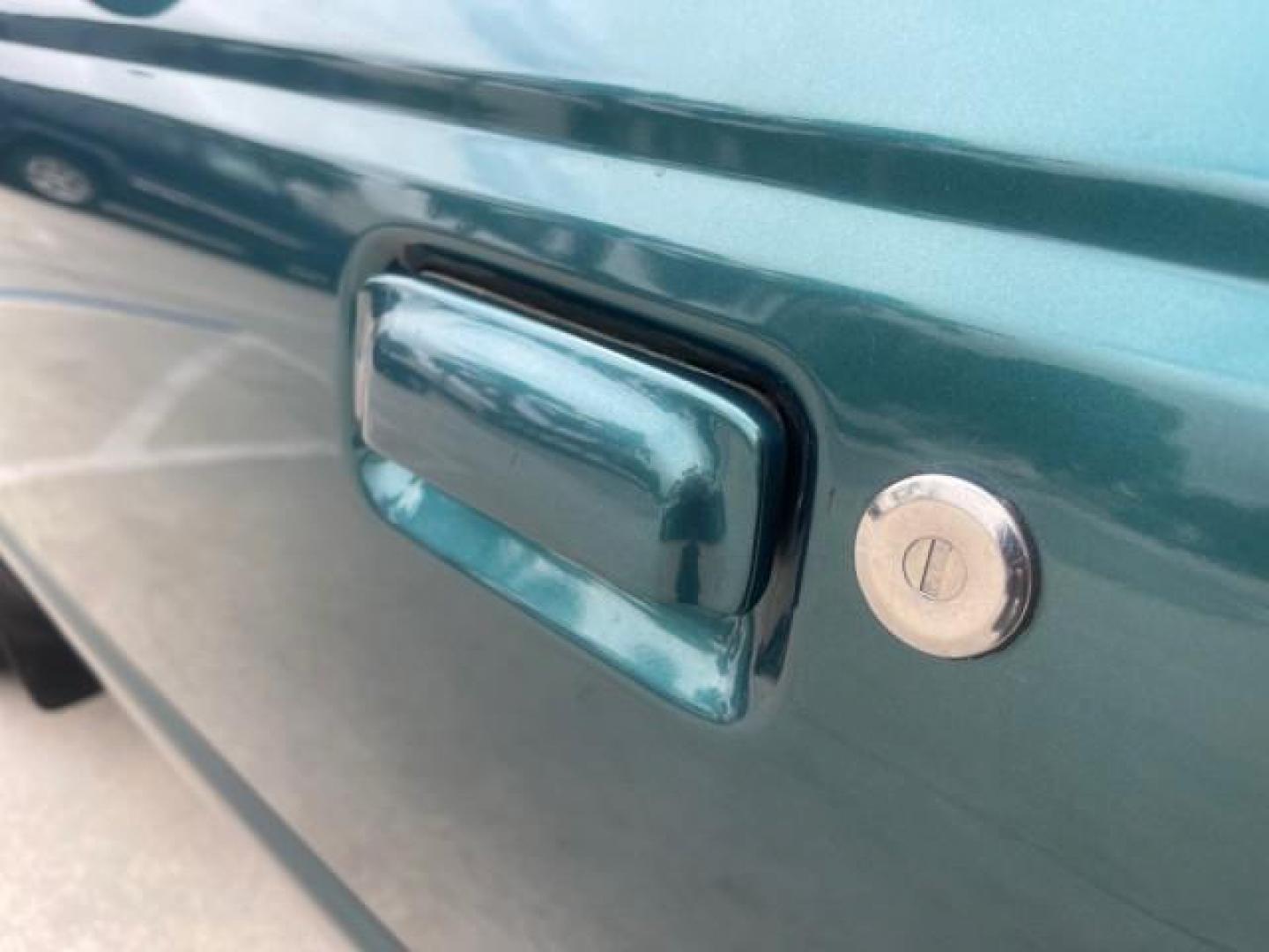 1998 Deep Emerald Green (CC/Met) /Medium Graphite Ford Ranger XL LOW MILES 4 CYL LOW MILES (1FTYR10C0WP) with an 2.5L EFI 4-Cyl Engine engine, Automatic transmission, located at 4701 North Dixie Hwy, Pompano Beach, FL, 33064, (954) 422-2889, 26.240938, -80.123474 - OUR WEBPAGE FLORIDACARS1.COM HAS OVER 100 PHOTOS AND FREE CARFAX LINK 1998 FORD RANGER SPLASH FLARESIDE VIN: 1FTYR10C0WPA84443 1 F T Y R 1 0 C 0 W P A 8 4 4 4 3 PICKUP 2.5L I4 F SOHC 8V GASOLINE 27 MPG REAR WHEEL DRIVE Features ABS Brakes Automatic Transmission Cassette Player Cloth Seats Ice Cold A - Photo#38