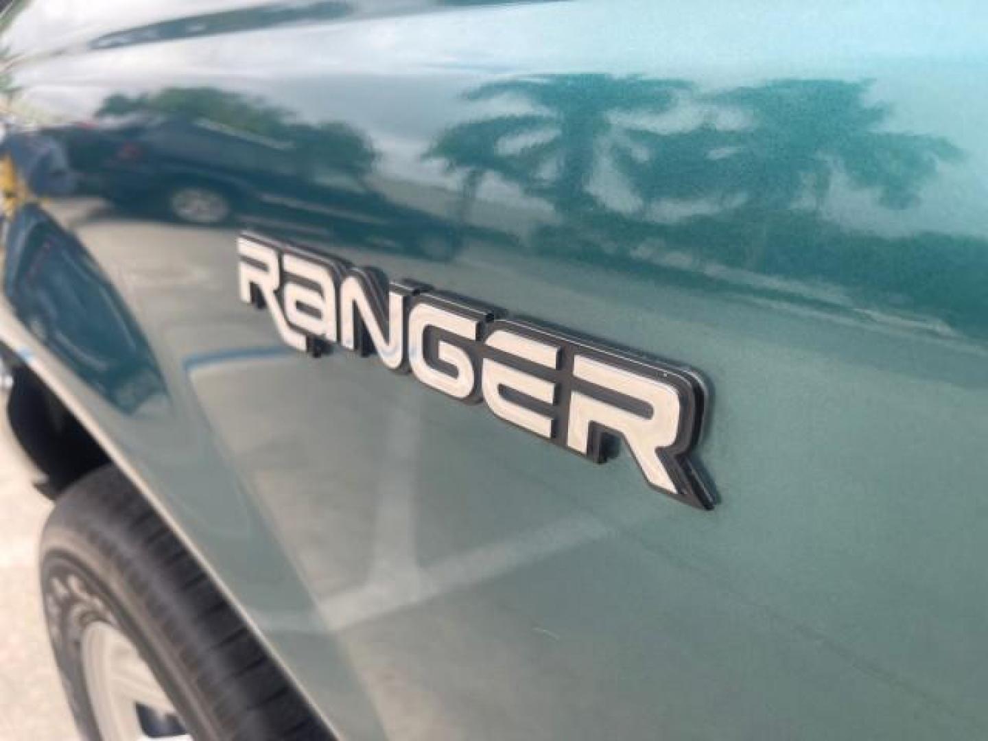 1998 Deep Emerald Green (CC/Met) /Medium Graphite Ford Ranger XL LOW MILES 4 CYL LOW MILES (1FTYR10C0WP) with an 2.5L EFI 4-Cyl Engine engine, Automatic transmission, located at 4701 North Dixie Hwy, Pompano Beach, FL, 33064, (954) 422-2889, 26.240938, -80.123474 - OUR WEBPAGE FLORIDACARS1.COM HAS OVER 100 PHOTOS AND FREE CARFAX LINK 1998 FORD RANGER SPLASH FLARESIDE VIN: 1FTYR10C0WPA84443 1 F T Y R 1 0 C 0 W P A 8 4 4 4 3 PICKUP 2.5L I4 F SOHC 8V GASOLINE 27 MPG REAR WHEEL DRIVE Features ABS Brakes Automatic Transmission Cassette Player Cloth Seats Ice Cold A - Photo#41