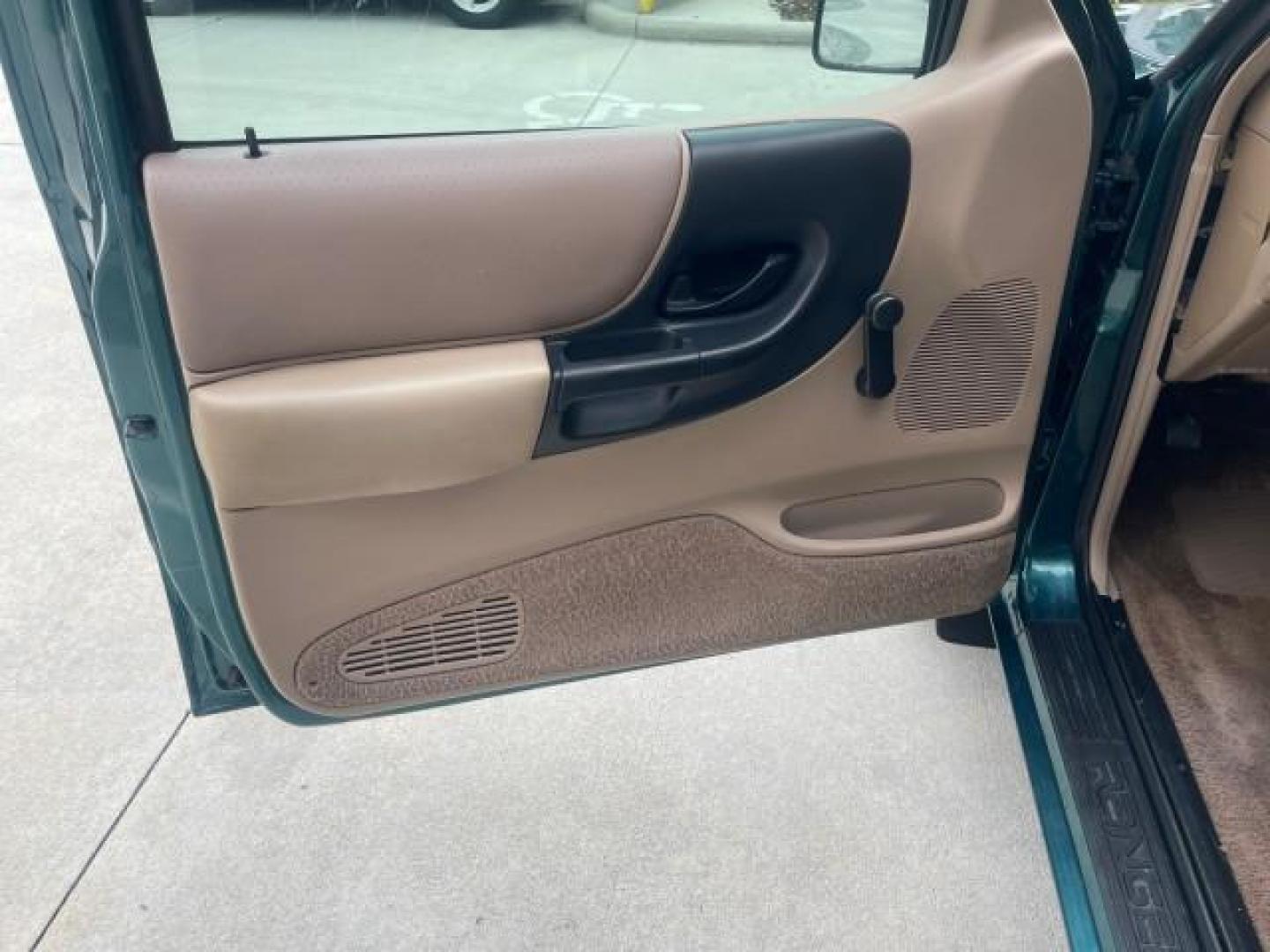 1998 Deep Emerald Green (CC/Met) /Medium Graphite Ford Ranger XL LOW MILES 4 CYL LOW MILES (1FTYR10C0WP) with an 2.5L EFI 4-Cyl Engine engine, Automatic transmission, located at 4701 North Dixie Hwy, Pompano Beach, FL, 33064, (954) 422-2889, 26.240938, -80.123474 - OUR WEBPAGE FLORIDACARS1.COM HAS OVER 100 PHOTOS AND FREE CARFAX LINK 1998 FORD RANGER SPLASH FLARESIDE VIN: 1FTYR10C0WPA84443 1 F T Y R 1 0 C 0 W P A 8 4 4 4 3 PICKUP 2.5L I4 F SOHC 8V GASOLINE 27 MPG REAR WHEEL DRIVE Features ABS Brakes Automatic Transmission Cassette Player Cloth Seats Ice Cold A - Photo#42