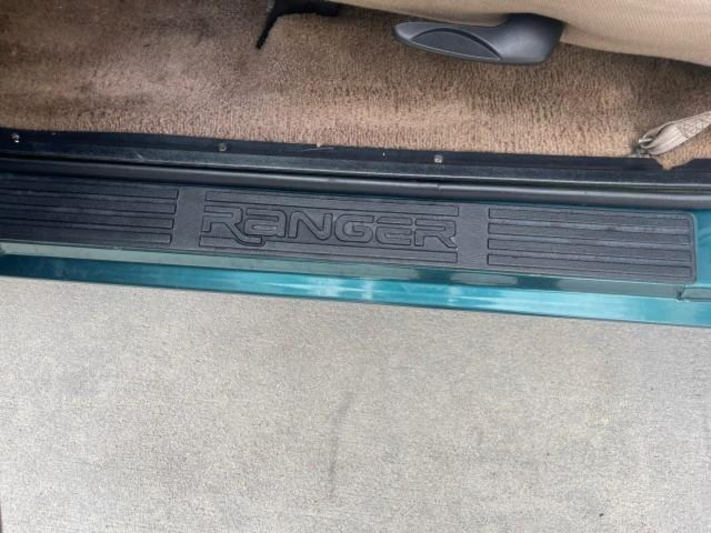 1998 Deep Emerald Green (CC/Met) /Medium Graphite Ford Ranger XL LOW MILES 4 CYL LOW MILES (1FTYR10C0WP) with an 2.5L EFI 4-Cyl Engine engine, Automatic transmission, located at 4701 North Dixie Hwy, Pompano Beach, FL, 33064, (954) 422-2889, 26.240938, -80.123474 - OUR WEBPAGE FLORIDACARS1.COM HAS OVER 100 PHOTOS AND FREE CARFAX LINK 1998 FORD RANGER SPLASH FLARESIDE VIN: 1FTYR10C0WPA84443 1 F T Y R 1 0 C 0 W P A 8 4 4 4 3 PICKUP 2.5L I4 F SOHC 8V GASOLINE 27 MPG REAR WHEEL DRIVE Features ABS Brakes Automatic Transmission Cassette Player Cloth Seats Ice Cold A - Photo#43
