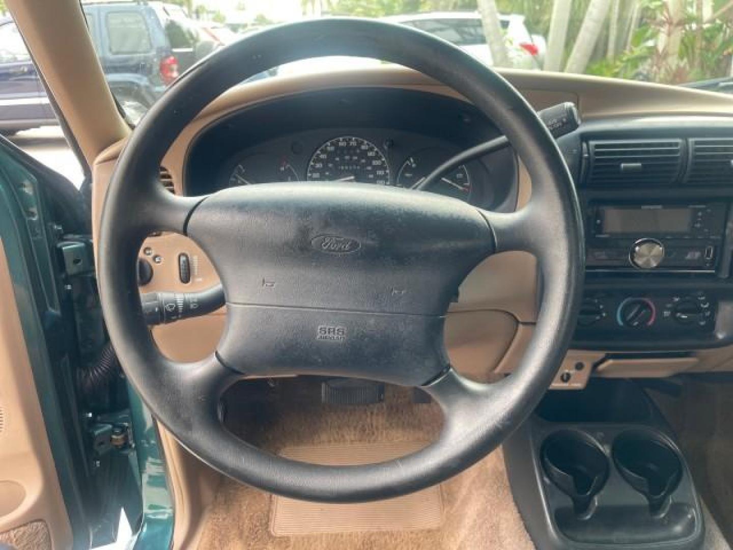 1998 Deep Emerald Green (CC/Met) /Medium Graphite Ford Ranger XL LOW MILES 4 CYL LOW MILES (1FTYR10C0WP) with an 2.5L EFI 4-Cyl Engine engine, Automatic transmission, located at 4701 North Dixie Hwy, Pompano Beach, FL, 33064, (954) 422-2889, 26.240938, -80.123474 - OUR WEBPAGE FLORIDACARS1.COM HAS OVER 100 PHOTOS AND FREE CARFAX LINK 1998 FORD RANGER SPLASH FLARESIDE VIN: 1FTYR10C0WPA84443 1 F T Y R 1 0 C 0 W P A 8 4 4 4 3 PICKUP 2.5L I4 F SOHC 8V GASOLINE 27 MPG REAR WHEEL DRIVE Features ABS Brakes Automatic Transmission Cassette Player Cloth Seats Ice Cold A - Photo#49