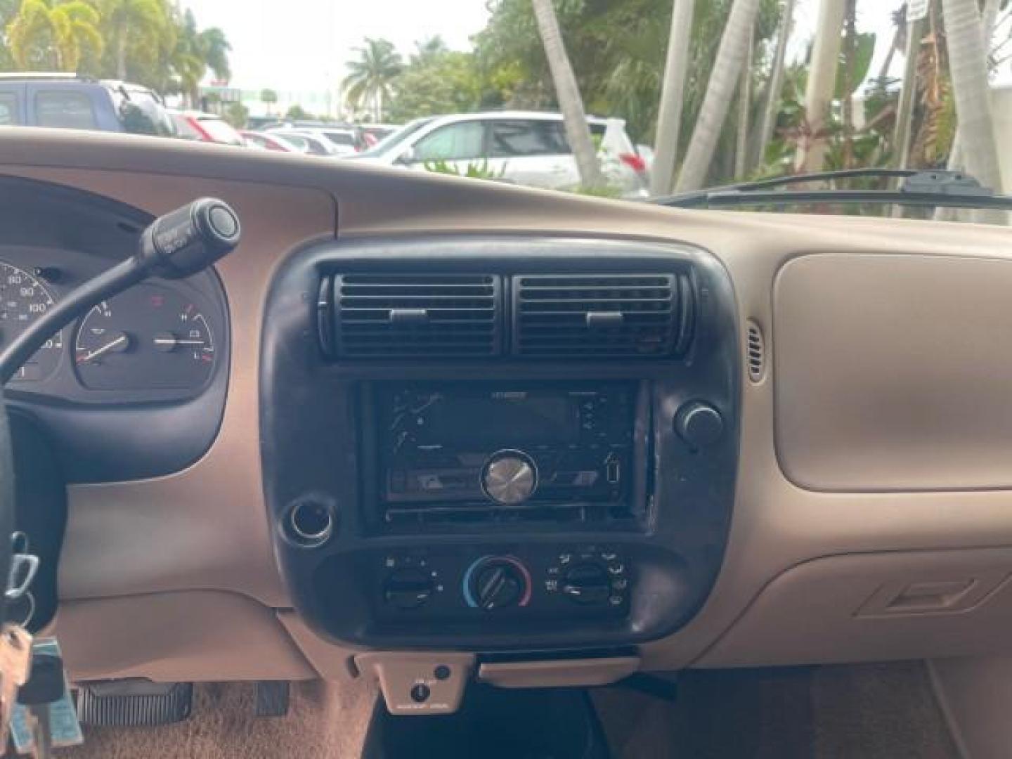 1998 Deep Emerald Green (CC/Met) /Medium Graphite Ford Ranger XL LOW MILES 4 CYL LOW MILES (1FTYR10C0WP) with an 2.5L EFI 4-Cyl Engine engine, Automatic transmission, located at 4701 North Dixie Hwy, Pompano Beach, FL, 33064, (954) 422-2889, 26.240938, -80.123474 - OUR WEBPAGE FLORIDACARS1.COM HAS OVER 100 PHOTOS AND FREE CARFAX LINK 1998 FORD RANGER SPLASH FLARESIDE VIN: 1FTYR10C0WPA84443 1 F T Y R 1 0 C 0 W P A 8 4 4 4 3 PICKUP 2.5L I4 F SOHC 8V GASOLINE 27 MPG REAR WHEEL DRIVE Features ABS Brakes Automatic Transmission Cassette Player Cloth Seats Ice Cold A - Photo#55