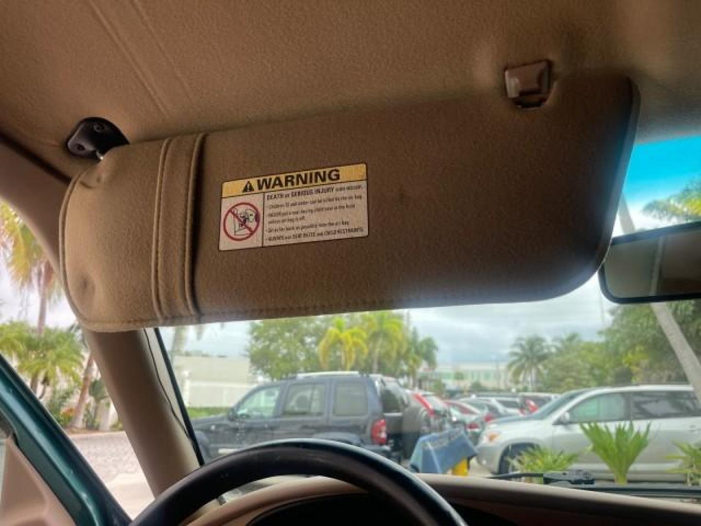 1998 Deep Emerald Green (CC/Met) /Medium Graphite Ford Ranger XL LOW MILES 4 CYL LOW MILES (1FTYR10C0WP) with an 2.5L EFI 4-Cyl Engine engine, Automatic transmission, located at 4701 North Dixie Hwy, Pompano Beach, FL, 33064, (954) 422-2889, 26.240938, -80.123474 - OUR WEBPAGE FLORIDACARS1.COM HAS OVER 100 PHOTOS AND FREE CARFAX LINK 1998 FORD RANGER SPLASH FLARESIDE VIN: 1FTYR10C0WPA84443 1 F T Y R 1 0 C 0 W P A 8 4 4 4 3 PICKUP 2.5L I4 F SOHC 8V GASOLINE 27 MPG REAR WHEEL DRIVE Features ABS Brakes Automatic Transmission Cassette Player Cloth Seats Ice Cold A - Photo#60