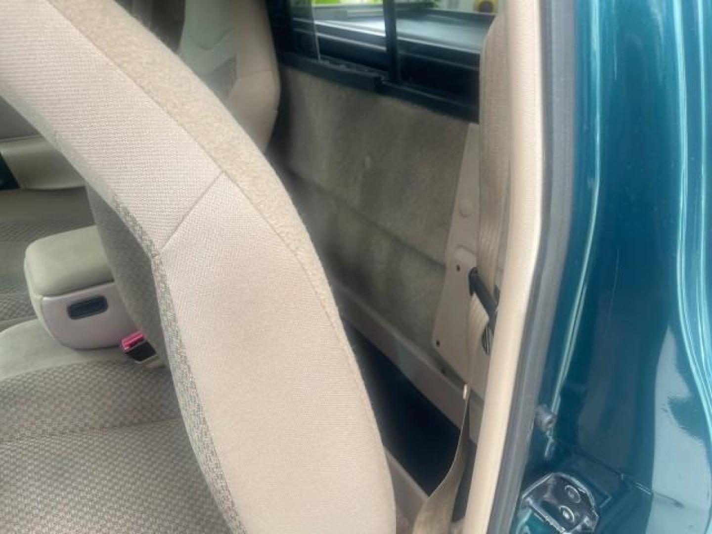 1998 Deep Emerald Green (CC/Met) /Medium Graphite Ford Ranger XL LOW MILES 4 CYL LOW MILES (1FTYR10C0WP) with an 2.5L EFI 4-Cyl Engine engine, Automatic transmission, located at 4701 North Dixie Hwy, Pompano Beach, FL, 33064, (954) 422-2889, 26.240938, -80.123474 - OUR WEBPAGE FLORIDACARS1.COM HAS OVER 100 PHOTOS AND FREE CARFAX LINK 1998 FORD RANGER SPLASH FLARESIDE VIN: 1FTYR10C0WPA84443 1 F T Y R 1 0 C 0 W P A 8 4 4 4 3 PICKUP 2.5L I4 F SOHC 8V GASOLINE 27 MPG REAR WHEEL DRIVE Features ABS Brakes Automatic Transmission Cassette Player Cloth Seats Ice Cold A - Photo#67