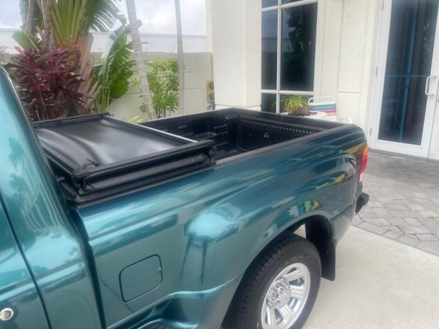 1998 Deep Emerald Green (CC/Met) /Medium Graphite Ford Ranger XL LOW MILES 4 CYL LOW MILES (1FTYR10C0WP) with an 2.5L EFI 4-Cyl Engine engine, Automatic transmission, located at 4701 North Dixie Hwy, Pompano Beach, FL, 33064, (954) 422-2889, 26.240938, -80.123474 - OUR WEBPAGE FLORIDACARS1.COM HAS OVER 100 PHOTOS AND FREE CARFAX LINK 1998 FORD RANGER SPLASH FLARESIDE VIN: 1FTYR10C0WPA84443 1 F T Y R 1 0 C 0 W P A 8 4 4 4 3 PICKUP 2.5L I4 F SOHC 8V GASOLINE 27 MPG REAR WHEEL DRIVE Features ABS Brakes Automatic Transmission Cassette Player Cloth Seats Ice Cold A - Photo#70