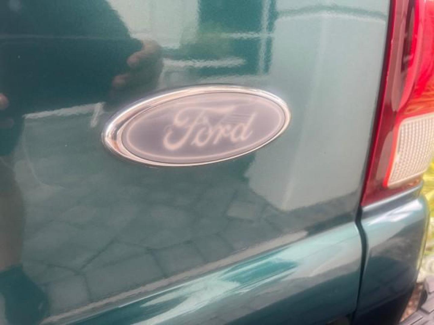 1998 Deep Emerald Green (CC/Met) /Medium Graphite Ford Ranger XL LOW MILES 4 CYL LOW MILES (1FTYR10C0WP) with an 2.5L EFI 4-Cyl Engine engine, Automatic transmission, located at 4701 North Dixie Hwy, Pompano Beach, FL, 33064, (954) 422-2889, 26.240938, -80.123474 - OUR WEBPAGE FLORIDACARS1.COM HAS OVER 100 PHOTOS AND FREE CARFAX LINK 1998 FORD RANGER SPLASH FLARESIDE VIN: 1FTYR10C0WPA84443 1 F T Y R 1 0 C 0 W P A 8 4 4 4 3 PICKUP 2.5L I4 F SOHC 8V GASOLINE 27 MPG REAR WHEEL DRIVE Features ABS Brakes Automatic Transmission Cassette Player Cloth Seats Ice Cold A - Photo#85