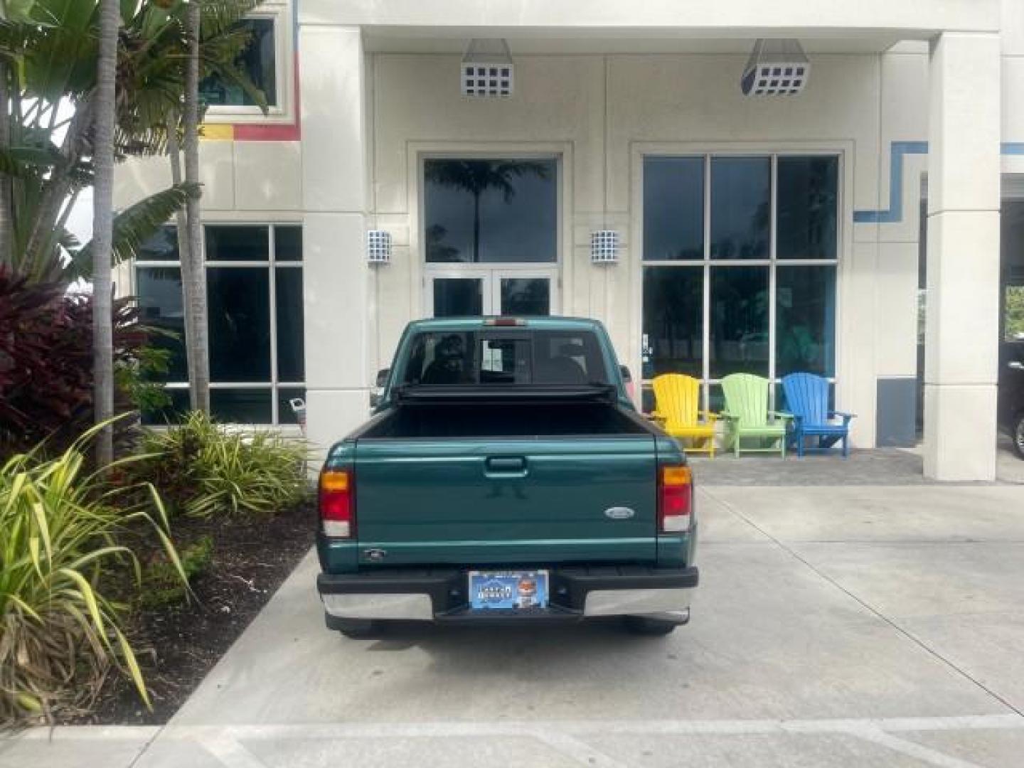 1998 Deep Emerald Green (CC/Met) /Medium Graphite Ford Ranger XL LOW MILES 4 CYL LOW MILES (1FTYR10C0WP) with an 2.5L EFI 4-Cyl Engine engine, Automatic transmission, located at 4701 North Dixie Hwy, Pompano Beach, FL, 33064, (954) 422-2889, 26.240938, -80.123474 - OUR WEBPAGE FLORIDACARS1.COM HAS OVER 100 PHOTOS AND FREE CARFAX LINK 1998 FORD RANGER SPLASH FLARESIDE VIN: 1FTYR10C0WPA84443 1 F T Y R 1 0 C 0 W P A 8 4 4 4 3 PICKUP 2.5L I4 F SOHC 8V GASOLINE 27 MPG REAR WHEEL DRIVE Features ABS Brakes Automatic Transmission Cassette Player Cloth Seats Ice Cold A - Photo#87