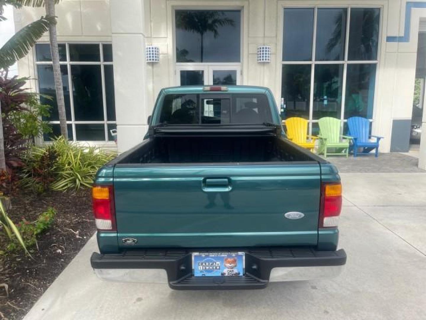 1998 Deep Emerald Green (CC/Met) /Medium Graphite Ford Ranger XL LOW MILES 4 CYL LOW MILES (1FTYR10C0WP) with an 2.5L EFI 4-Cyl Engine engine, Automatic transmission, located at 4701 North Dixie Hwy, Pompano Beach, FL, 33064, (954) 422-2889, 26.240938, -80.123474 - OUR WEBPAGE FLORIDACARS1.COM HAS OVER 100 PHOTOS AND FREE CARFAX LINK 1998 FORD RANGER SPLASH FLARESIDE VIN: 1FTYR10C0WPA84443 1 F T Y R 1 0 C 0 W P A 8 4 4 4 3 PICKUP 2.5L I4 F SOHC 8V GASOLINE 27 MPG REAR WHEEL DRIVE Features ABS Brakes Automatic Transmission Cassette Player Cloth Seats Ice Cold A - Photo#88