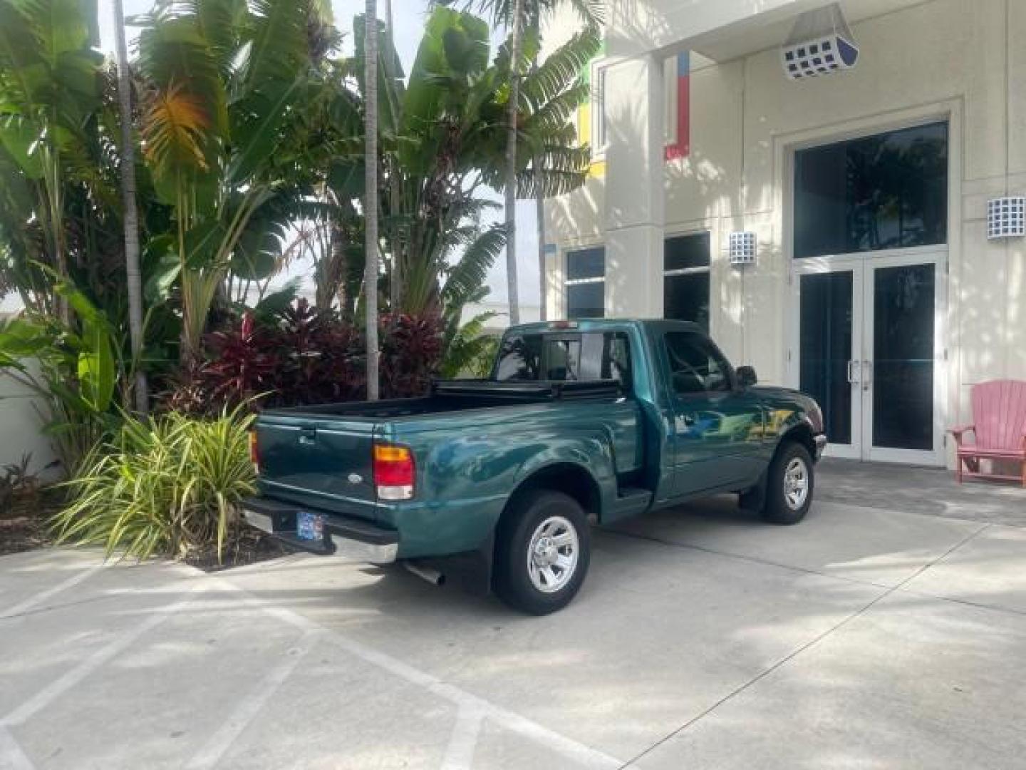 1998 Deep Emerald Green (CC/Met) /Medium Graphite Ford Ranger XL LOW MILES 4 CYL LOW MILES (1FTYR10C0WP) with an 2.5L EFI 4-Cyl Engine engine, Automatic transmission, located at 4701 North Dixie Hwy, Pompano Beach, FL, 33064, (954) 422-2889, 26.240938, -80.123474 - OUR WEBPAGE FLORIDACARS1.COM HAS OVER 100 PHOTOS AND FREE CARFAX LINK 1998 FORD RANGER SPLASH FLARESIDE VIN: 1FTYR10C0WPA84443 1 F T Y R 1 0 C 0 W P A 8 4 4 4 3 PICKUP 2.5L I4 F SOHC 8V GASOLINE 27 MPG REAR WHEEL DRIVE Features ABS Brakes Automatic Transmission Cassette Player Cloth Seats Ice Cold A - Photo#89