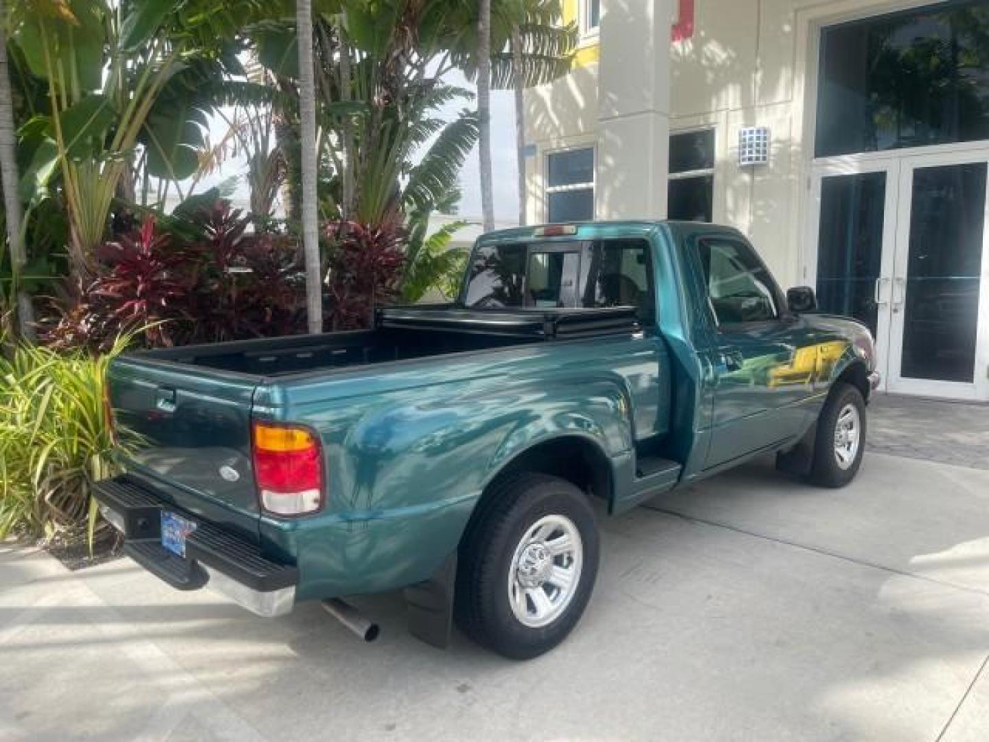 1998 Deep Emerald Green (CC/Met) /Medium Graphite Ford Ranger XL LOW MILES 4 CYL LOW MILES (1FTYR10C0WP) with an 2.5L EFI 4-Cyl Engine engine, Automatic transmission, located at 4701 North Dixie Hwy, Pompano Beach, FL, 33064, (954) 422-2889, 26.240938, -80.123474 - OUR WEBPAGE FLORIDACARS1.COM HAS OVER 100 PHOTOS AND FREE CARFAX LINK 1998 FORD RANGER SPLASH FLARESIDE VIN: 1FTYR10C0WPA84443 1 F T Y R 1 0 C 0 W P A 8 4 4 4 3 PICKUP 2.5L I4 F SOHC 8V GASOLINE 27 MPG REAR WHEEL DRIVE Features ABS Brakes Automatic Transmission Cassette Player Cloth Seats Ice Cold A - Photo#90