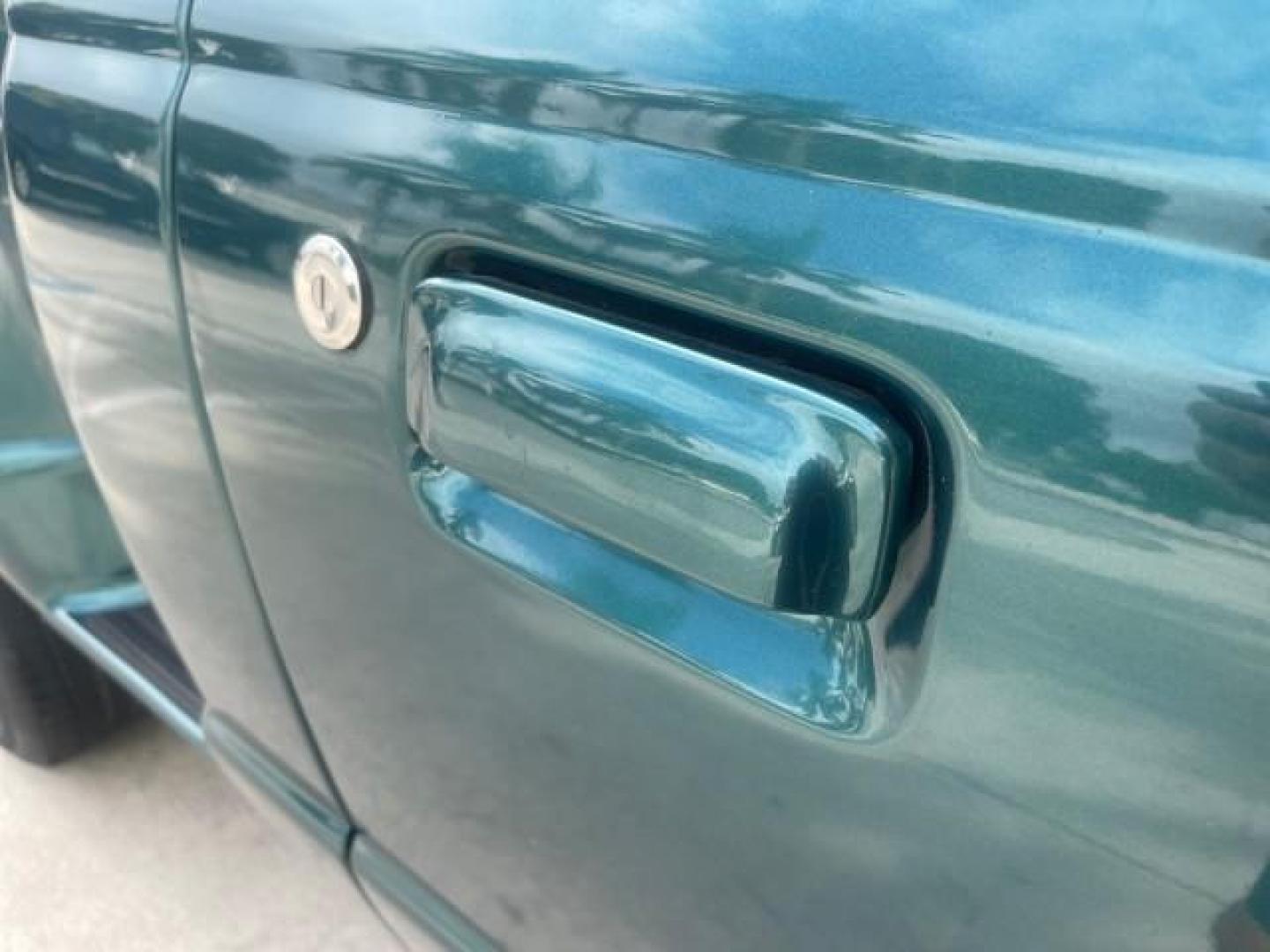 1998 Deep Emerald Green (CC/Met) /Medium Graphite Ford Ranger XL LOW MILES 4 CYL LOW MILES (1FTYR10C0WP) with an 2.5L EFI 4-Cyl Engine engine, Automatic transmission, located at 4701 North Dixie Hwy, Pompano Beach, FL, 33064, (954) 422-2889, 26.240938, -80.123474 - OUR WEBPAGE FLORIDACARS1.COM HAS OVER 100 PHOTOS AND FREE CARFAX LINK 1998 FORD RANGER SPLASH FLARESIDE VIN: 1FTYR10C0WPA84443 1 F T Y R 1 0 C 0 W P A 8 4 4 4 3 PICKUP 2.5L I4 F SOHC 8V GASOLINE 27 MPG REAR WHEEL DRIVE Features ABS Brakes Automatic Transmission Cassette Player Cloth Seats Ice Cold A - Photo#97