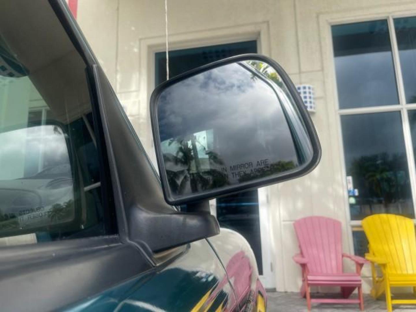 1998 Deep Emerald Green (CC/Met) /Medium Graphite Ford Ranger XL LOW MILES 4 CYL LOW MILES (1FTYR10C0WP) with an 2.5L EFI 4-Cyl Engine engine, Automatic transmission, located at 4701 North Dixie Hwy, Pompano Beach, FL, 33064, (954) 422-2889, 26.240938, -80.123474 - OUR WEBPAGE FLORIDACARS1.COM HAS OVER 100 PHOTOS AND FREE CARFAX LINK 1998 FORD RANGER SPLASH FLARESIDE VIN: 1FTYR10C0WPA84443 1 F T Y R 1 0 C 0 W P A 8 4 4 4 3 PICKUP 2.5L I4 F SOHC 8V GASOLINE 27 MPG REAR WHEEL DRIVE Features ABS Brakes Automatic Transmission Cassette Player Cloth Seats Ice Cold A - Photo#98