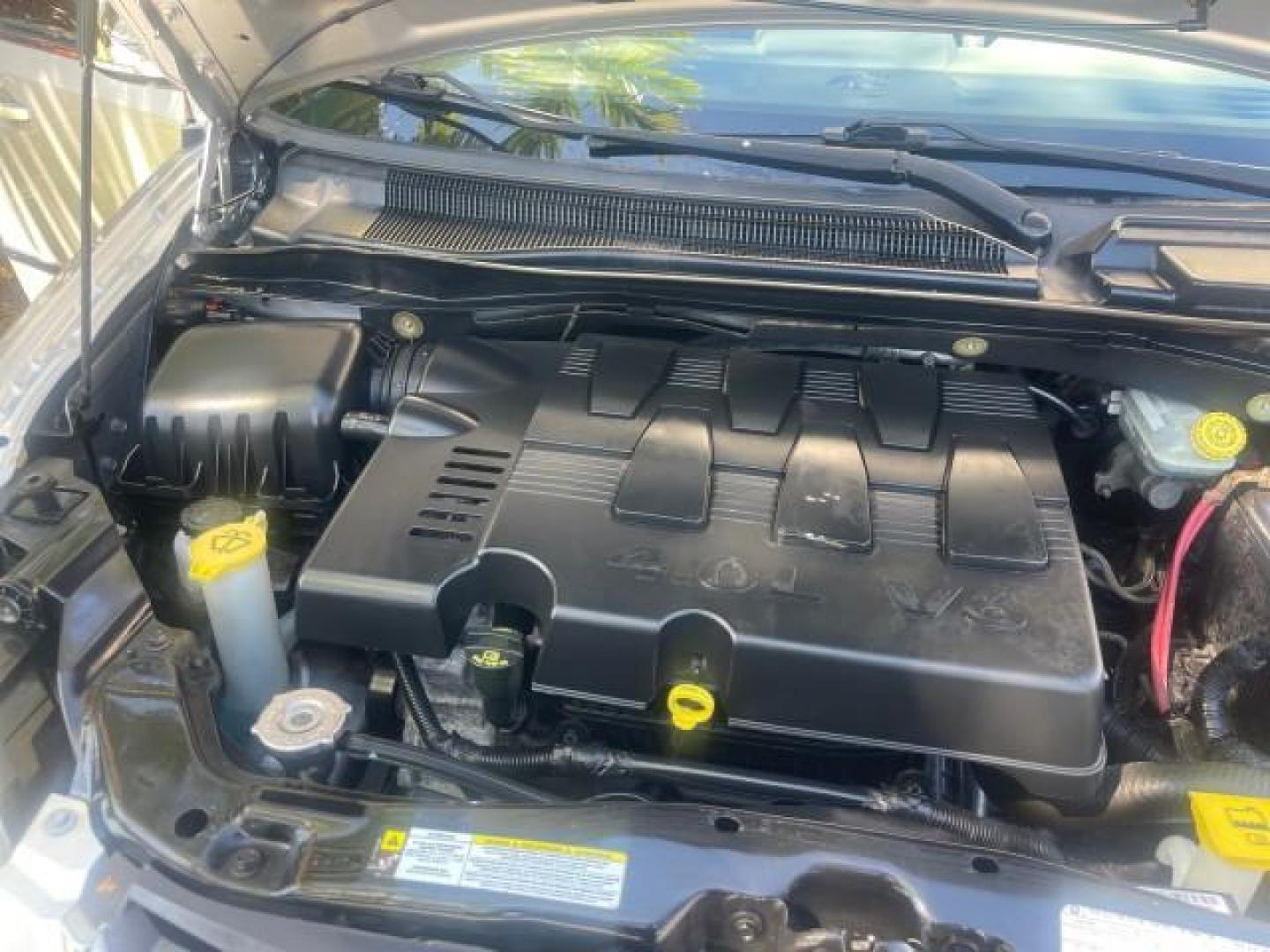 2010 Bright Silver Metallic /Dark slate/light shale Chrysler Town and Country Touring LOW MILES 37,217 1 OWNER (2A4RR5DX8AR) with an 4.0L SOHC SMPI 24v V6 Engine engine, Automatic transmission, located at 4701 North Dixie Hwy, Pompano Beach, FL, 33064, (954) 422-2889, 26.240938, -80.123474 - OUR WEBPAGE FLORIDACARS1.COM HAS OVER 100 PHOTOS AND FREE CARFAX LINK 2010 CHRYSLER TOWN AND COUNTRY TOURING-STOW AND GO SEATS NAVIGATION VIN: 2A4RR5DX8AR141479 2 A 4 R R 5 D X 8 A R 1 4 1 4 7 9 VAN 4.0L V6 F SOHC 24V GASOLINE FRONT WHEEL DRIVE Features ABS Brakes Air Conditioning Alloy Wheels AM/FM - Photo#25