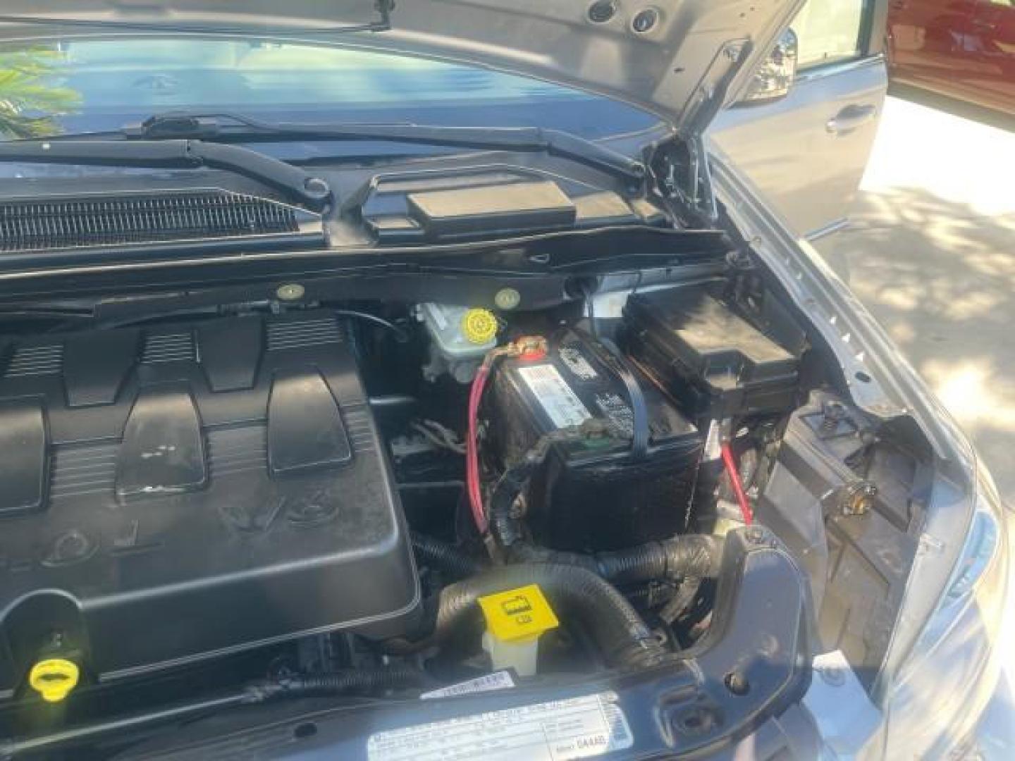 2010 Bright Silver Metallic /Dark slate/light shale Chrysler Town and Country Touring LOW MILES 37,217 1 OWNER (2A4RR5DX8AR) with an 4.0L SOHC SMPI 24v V6 Engine engine, Automatic transmission, located at 4701 North Dixie Hwy, Pompano Beach, FL, 33064, (954) 422-2889, 26.240938, -80.123474 - OUR WEBPAGE FLORIDACARS1.COM HAS OVER 100 PHOTOS AND FREE CARFAX LINK 2010 CHRYSLER TOWN AND COUNTRY TOURING-STOW AND GO SEATS NAVIGATION VIN: 2A4RR5DX8AR141479 2 A 4 R R 5 D X 8 A R 1 4 1 4 7 9 VAN 4.0L V6 F SOHC 24V GASOLINE FRONT WHEEL DRIVE Features ABS Brakes Air Conditioning Alloy Wheels AM/FM - Photo#26