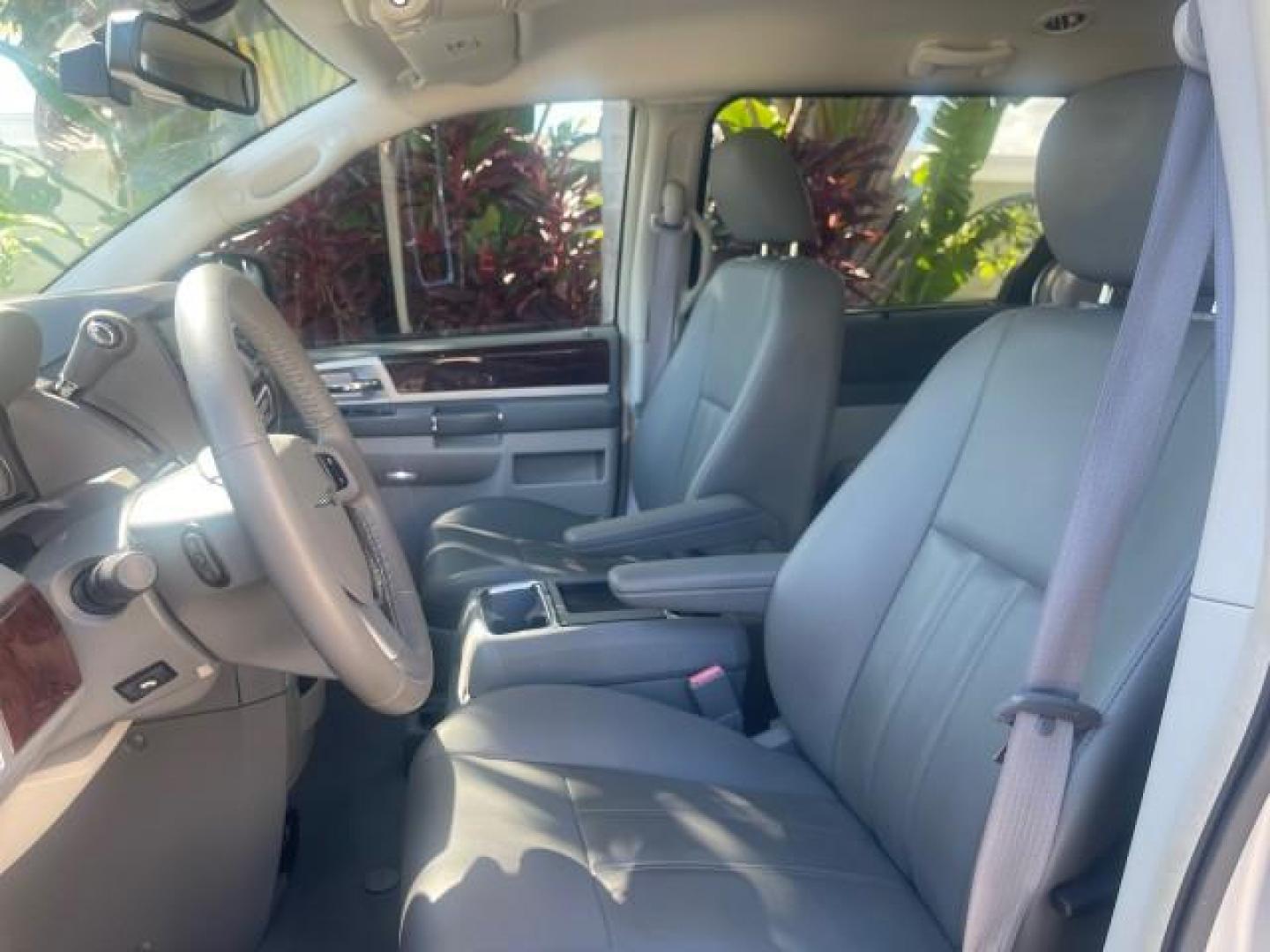 2010 Bright Silver Metallic /Dark slate/light shale Chrysler Town and Country Touring LOW MILES 37,217 1 OWNER (2A4RR5DX8AR) with an 4.0L SOHC SMPI 24v V6 Engine engine, Automatic transmission, located at 4701 North Dixie Hwy, Pompano Beach, FL, 33064, (954) 422-2889, 26.240938, -80.123474 - OUR WEBPAGE FLORIDACARS1.COM HAS OVER 100 PHOTOS AND FREE CARFAX LINK 2010 CHRYSLER TOWN AND COUNTRY TOURING-STOW AND GO SEATS NAVIGATION VIN: 2A4RR5DX8AR141479 2 A 4 R R 5 D X 8 A R 1 4 1 4 7 9 VAN 4.0L V6 F SOHC 24V GASOLINE FRONT WHEEL DRIVE Features ABS Brakes Air Conditioning Alloy Wheels AM/FM - Photo#43