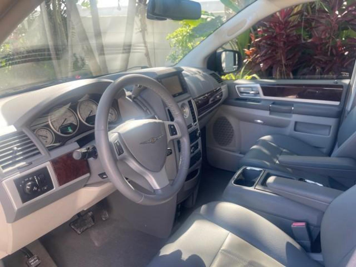2010 Bright Silver Metallic /Dark slate/light shale Chrysler Town and Country Touring LOW MILES 37,217 1 OWNER (2A4RR5DX8AR) with an 4.0L SOHC SMPI 24v V6 Engine engine, Automatic transmission, located at 4701 North Dixie Hwy, Pompano Beach, FL, 33064, (954) 422-2889, 26.240938, -80.123474 - OUR WEBPAGE FLORIDACARS1.COM HAS OVER 100 PHOTOS AND FREE CARFAX LINK 2010 CHRYSLER TOWN AND COUNTRY TOURING-STOW AND GO SEATS NAVIGATION VIN: 2A4RR5DX8AR141479 2 A 4 R R 5 D X 8 A R 1 4 1 4 7 9 VAN 4.0L V6 F SOHC 24V GASOLINE FRONT WHEEL DRIVE Features ABS Brakes Air Conditioning Alloy Wheels AM/FM - Photo#46