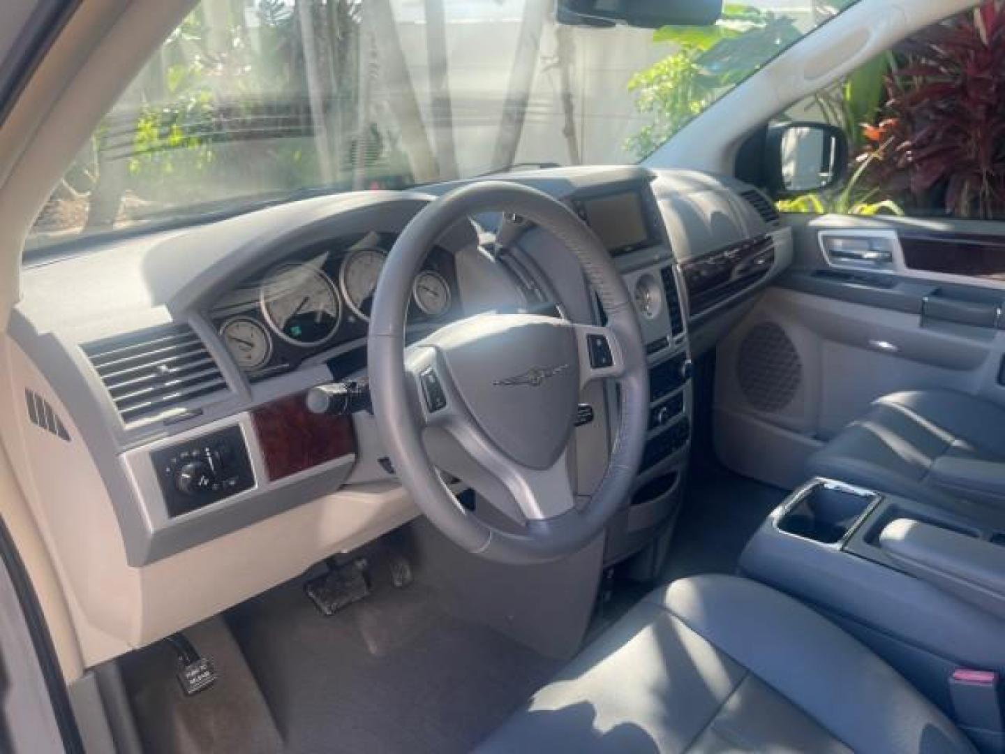 2010 Bright Silver Metallic /Dark slate/light shale Chrysler Town and Country Touring LOW MILES 37,217 1 OWNER (2A4RR5DX8AR) with an 4.0L SOHC SMPI 24v V6 Engine engine, Automatic transmission, located at 4701 North Dixie Hwy, Pompano Beach, FL, 33064, (954) 422-2889, 26.240938, -80.123474 - OUR WEBPAGE FLORIDACARS1.COM HAS OVER 100 PHOTOS AND FREE CARFAX LINK 2010 CHRYSLER TOWN AND COUNTRY TOURING-STOW AND GO SEATS NAVIGATION VIN: 2A4RR5DX8AR141479 2 A 4 R R 5 D X 8 A R 1 4 1 4 7 9 VAN 4.0L V6 F SOHC 24V GASOLINE FRONT WHEEL DRIVE Features ABS Brakes Air Conditioning Alloy Wheels AM/FM - Photo#47