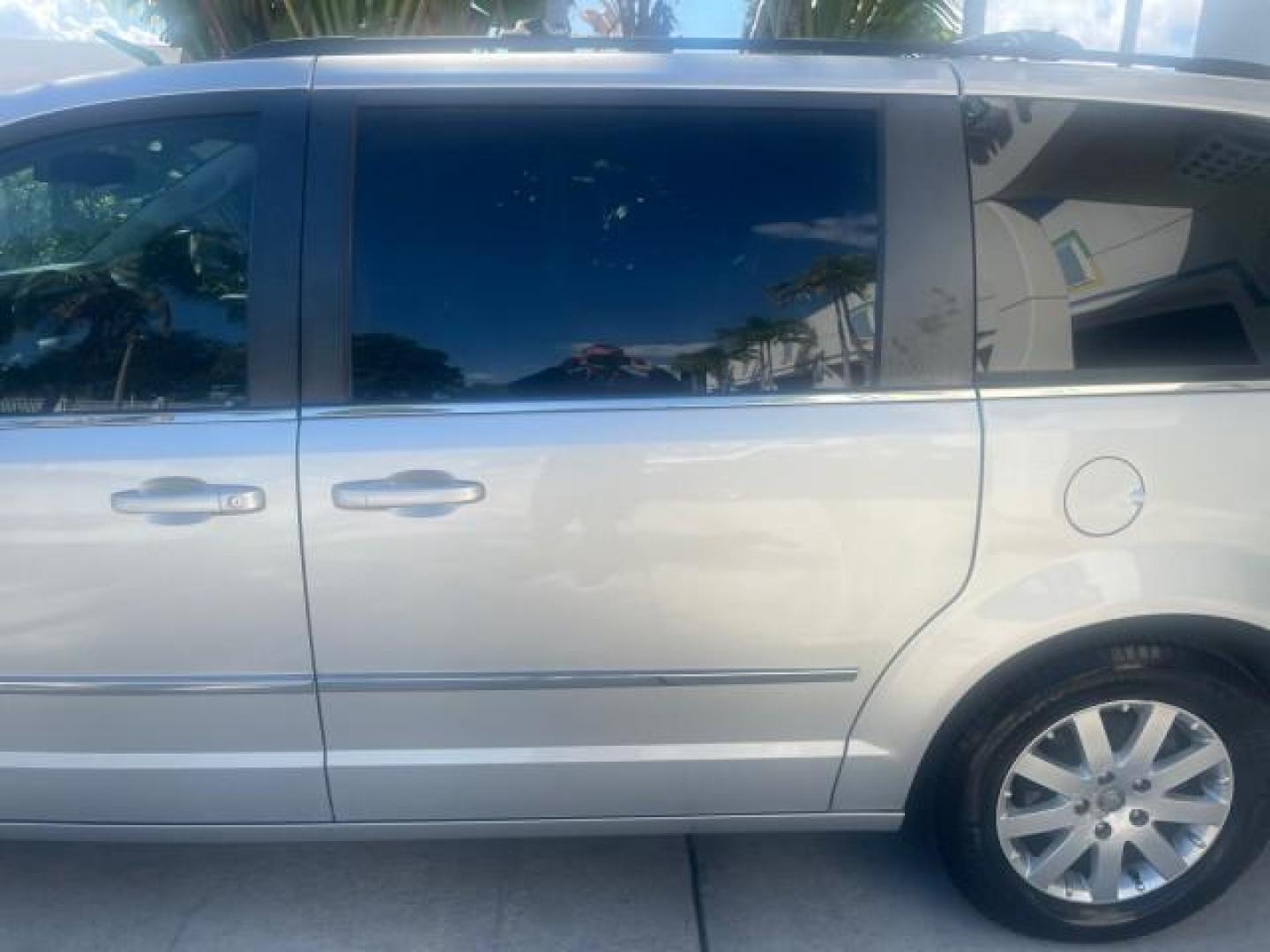 2010 Bright Silver Metallic /Dark slate/light shale Chrysler Town and Country Touring LOW MILES 37,217 1 OWNER (2A4RR5DX8AR) with an 4.0L SOHC SMPI 24v V6 Engine engine, Automatic transmission, located at 4701 North Dixie Hwy, Pompano Beach, FL, 33064, (954) 422-2889, 26.240938, -80.123474 - OUR WEBPAGE FLORIDACARS1.COM HAS OVER 100 PHOTOS AND FREE CARFAX LINK 2010 CHRYSLER TOWN AND COUNTRY TOURING-STOW AND GO SEATS NAVIGATION VIN: 2A4RR5DX8AR141479 2 A 4 R R 5 D X 8 A R 1 4 1 4 7 9 VAN 4.0L V6 F SOHC 24V GASOLINE FRONT WHEEL DRIVE Features ABS Brakes Air Conditioning Alloy Wheels AM/FM - Photo#71