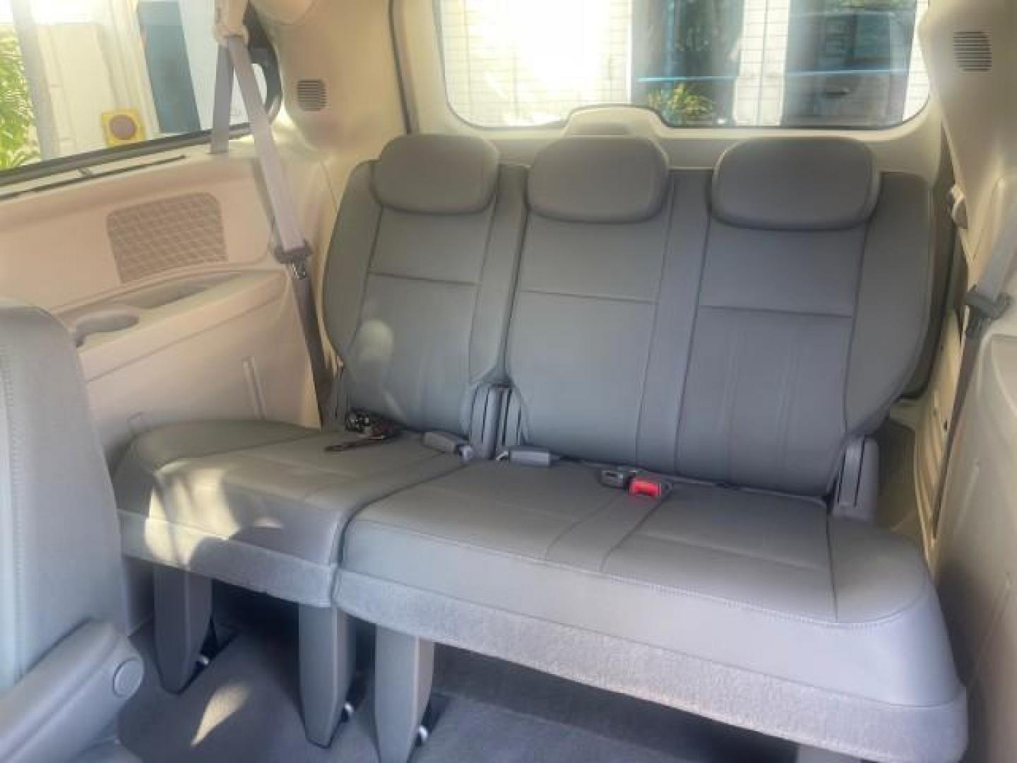 2010 Bright Silver Metallic /Dark slate/light shale Chrysler Town and Country Touring LOW MILES 37,217 1 OWNER (2A4RR5DX8AR) with an 4.0L SOHC SMPI 24v V6 Engine engine, Automatic transmission, located at 4701 North Dixie Hwy, Pompano Beach, FL, 33064, (954) 422-2889, 26.240938, -80.123474 - OUR WEBPAGE FLORIDACARS1.COM HAS OVER 100 PHOTOS AND FREE CARFAX LINK 2010 CHRYSLER TOWN AND COUNTRY TOURING-STOW AND GO SEATS NAVIGATION VIN: 2A4RR5DX8AR141479 2 A 4 R R 5 D X 8 A R 1 4 1 4 7 9 VAN 4.0L V6 F SOHC 24V GASOLINE FRONT WHEEL DRIVE Features ABS Brakes Air Conditioning Alloy Wheels AM/FM - Photo#80