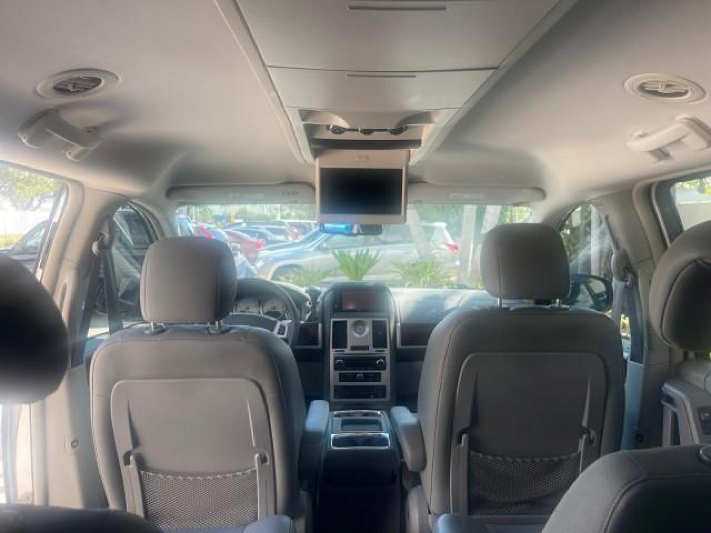 2010 Bright Silver Metallic /Dark slate/light shale Chrysler Town and Country Touring LOW MILES 37,217 1 OWNER (2A4RR5DX8AR) with an 4.0L SOHC SMPI 24v V6 Engine engine, Automatic transmission, located at 4701 North Dixie Hwy, Pompano Beach, FL, 33064, (954) 422-2889, 26.240938, -80.123474 - OUR WEBPAGE FLORIDACARS1.COM HAS OVER 100 PHOTOS AND FREE CARFAX LINK 2010 CHRYSLER TOWN AND COUNTRY TOURING-STOW AND GO SEATS NAVIGATION VIN: 2A4RR5DX8AR141479 2 A 4 R R 5 D X 8 A R 1 4 1 4 7 9 VAN 4.0L V6 F SOHC 24V GASOLINE FRONT WHEEL DRIVE Features ABS Brakes Air Conditioning Alloy Wheels AM/FM - Photo#87