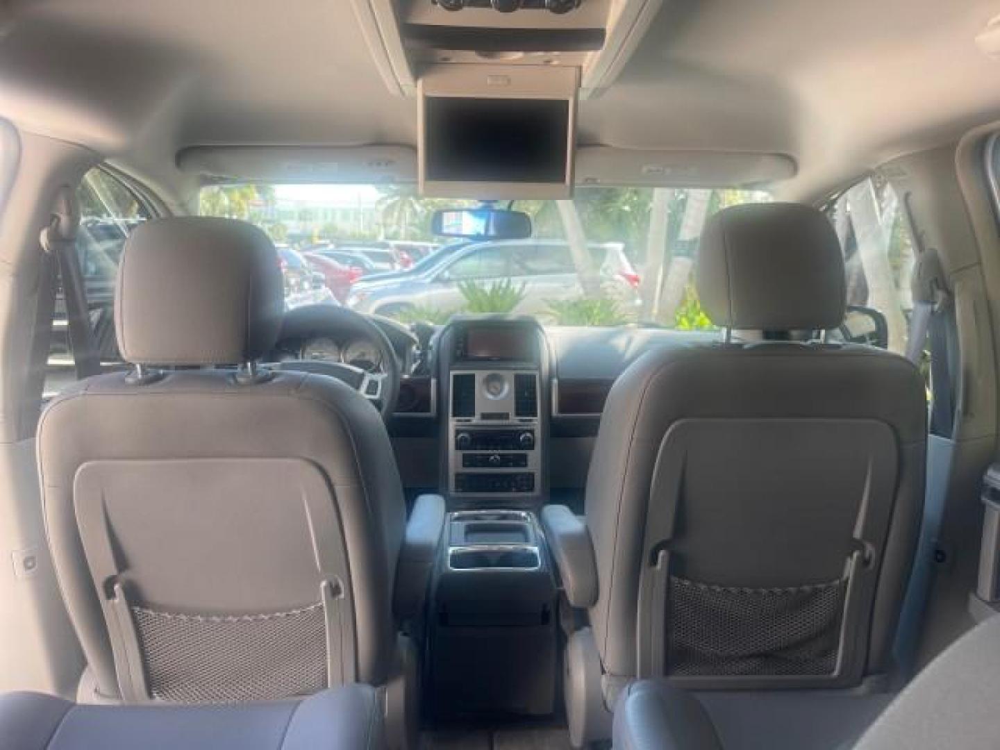 2010 Bright Silver Metallic /Dark slate/light shale Chrysler Town and Country Touring LOW MILES 37,217 1 OWNER (2A4RR5DX8AR) with an 4.0L SOHC SMPI 24v V6 Engine engine, Automatic transmission, located at 4701 North Dixie Hwy, Pompano Beach, FL, 33064, (954) 422-2889, 26.240938, -80.123474 - OUR WEBPAGE FLORIDACARS1.COM HAS OVER 100 PHOTOS AND FREE CARFAX LINK 2010 CHRYSLER TOWN AND COUNTRY TOURING-STOW AND GO SEATS NAVIGATION VIN: 2A4RR5DX8AR141479 2 A 4 R R 5 D X 8 A R 1 4 1 4 7 9 VAN 4.0L V6 F SOHC 24V GASOLINE FRONT WHEEL DRIVE Features ABS Brakes Air Conditioning Alloy Wheels AM/FM - Photo#90