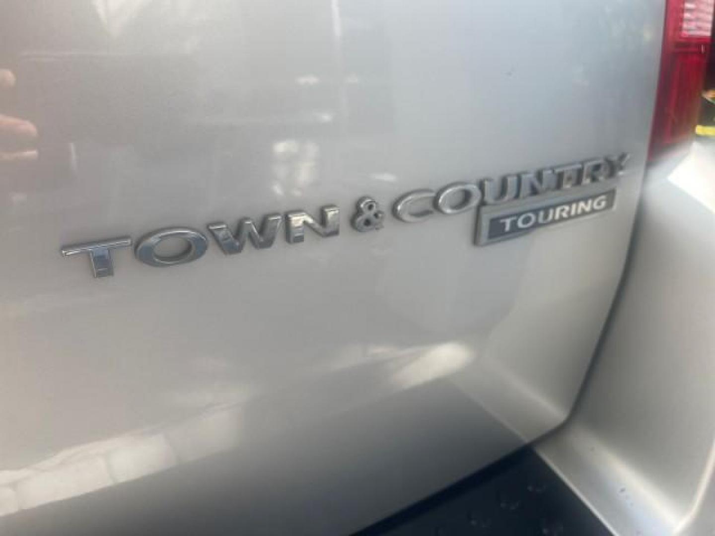 2010 Bright Silver Metallic /Dark slate/light shale Chrysler Town and Country Touring LOW MILES 37,217 1 OWNER (2A4RR5DX8AR) with an 4.0L SOHC SMPI 24v V6 Engine engine, Automatic transmission, located at 4701 North Dixie Hwy, Pompano Beach, FL, 33064, (954) 422-2889, 26.240938, -80.123474 - OUR WEBPAGE FLORIDACARS1.COM HAS OVER 100 PHOTOS AND FREE CARFAX LINK 2010 CHRYSLER TOWN AND COUNTRY TOURING-STOW AND GO SEATS NAVIGATION VIN: 2A4RR5DX8AR141479 2 A 4 R R 5 D X 8 A R 1 4 1 4 7 9 VAN 4.0L V6 F SOHC 24V GASOLINE FRONT WHEEL DRIVE Features ABS Brakes Air Conditioning Alloy Wheels AM/FM - Photo#99