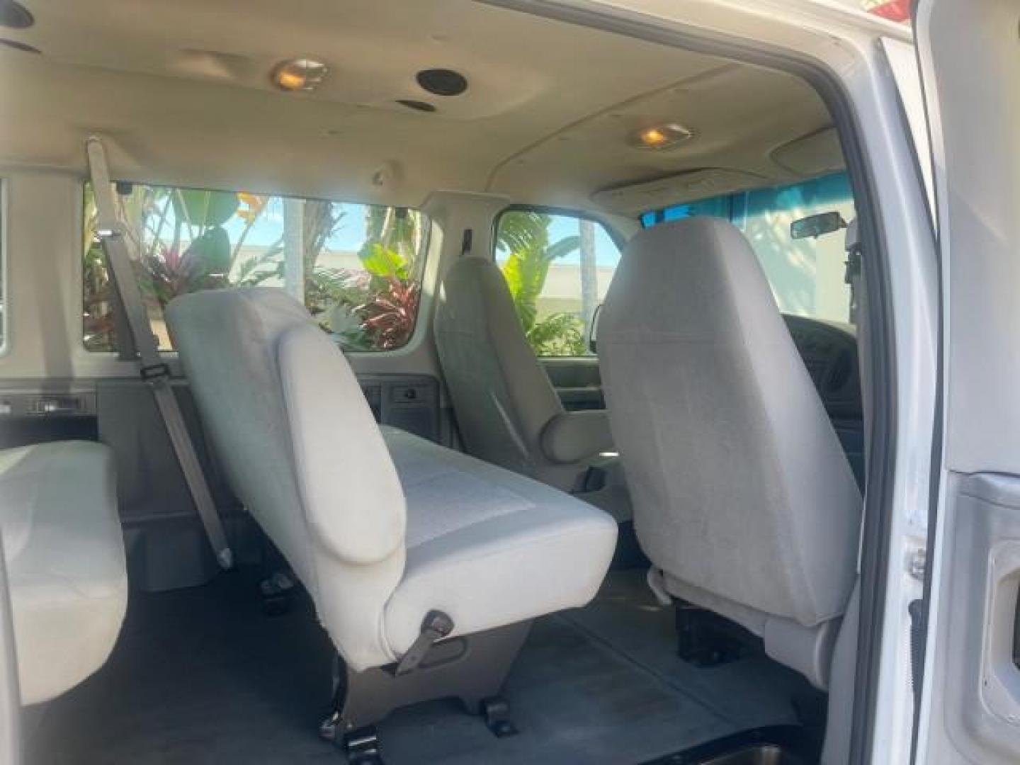 2006 Oxford White /Medium Flint Ford Econoline Wagon XLT LOW MILES 76,474 E350 15 PASS (1FBSS31L36H) with an 5.4L EFI V8 Engine engine, Automatic transmission, located at 4701 North Dixie Hwy, Pompano Beach, FL, 33064, (954) 422-2889, 26.240938, -80.123474 - OUR WEBPAGE FLORIDACARS1.COM HAS OVER 100 PHOTOS AND FREE CARFAX LINK 2006 FORD E-SERIES E-350 SD XLT 15 PASSENGER VAN NEW $29,805 VIN: 1FBSS31L36HA01462 1 F B S S 3 1 L 3 6 H A 0 1 4 6 2 VAN 5.4L V8 F GASOLINE REAR WHEEL DRIVE Features ABS Brakes Air Conditioning AM/FM Stereo Automatic Transmission - Photo#14