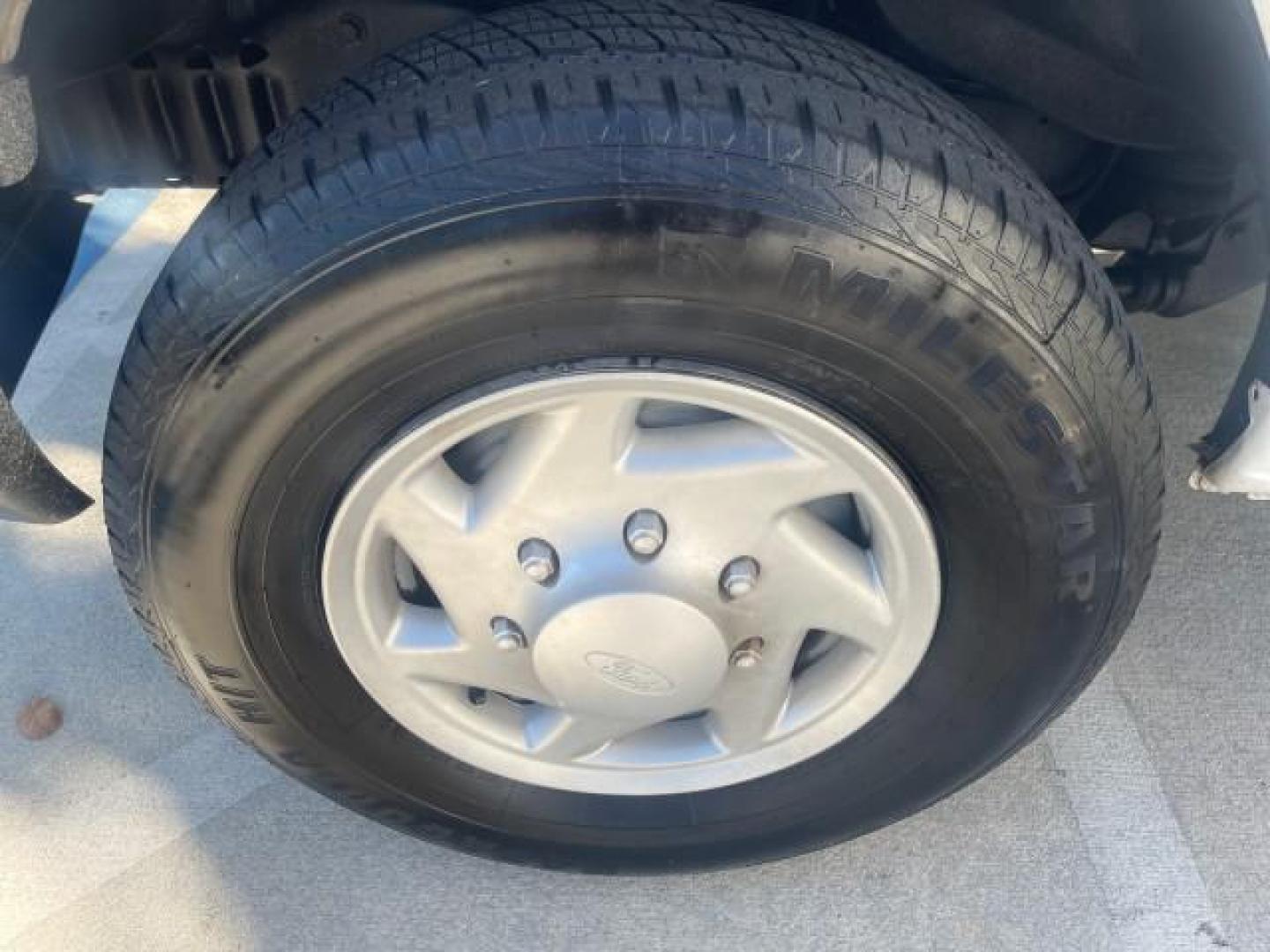 2006 Oxford White /Medium Flint Ford Econoline Wagon XLT LOW MILES 76,474 E350 15 PASS (1FBSS31L36H) with an 5.4L EFI V8 Engine engine, Automatic transmission, located at 4701 North Dixie Hwy, Pompano Beach, FL, 33064, (954) 422-2889, 26.240938, -80.123474 - OUR WEBPAGE FLORIDACARS1.COM HAS OVER 100 PHOTOS AND FREE CARFAX LINK 2006 FORD E-SERIES E-350 SD XLT 15 PASSENGER VAN NEW $29,805 VIN: 1FBSS31L36HA01462 1 F B S S 3 1 L 3 6 H A 0 1 4 6 2 VAN 5.4L V8 F GASOLINE REAR WHEEL DRIVE Features ABS Brakes Air Conditioning AM/FM Stereo Automatic Transmission - Photo#19