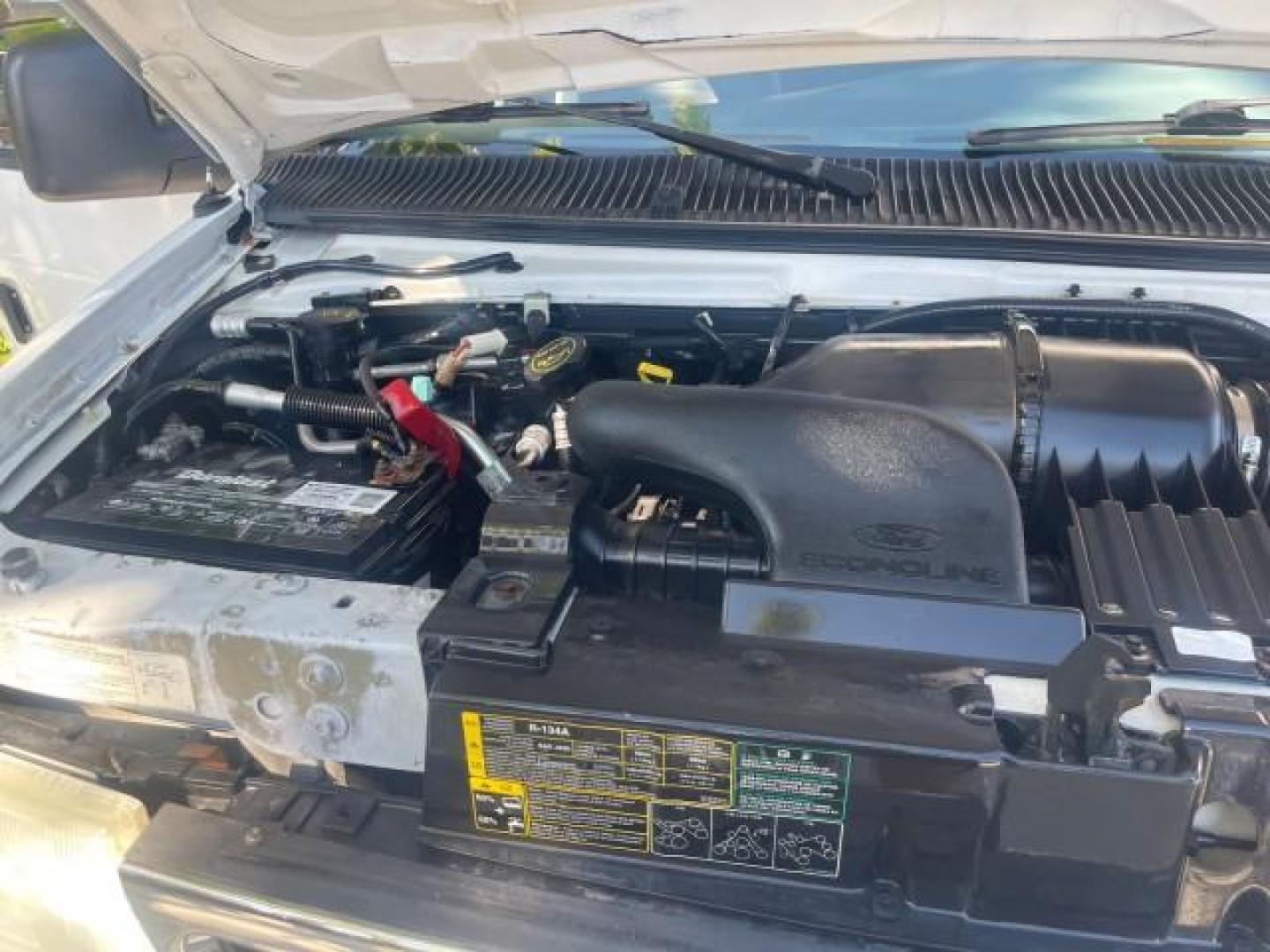 2006 Oxford White /Medium Flint Ford Econoline Wagon XLT LOW MILES 76,474 E350 15 PASS (1FBSS31L36H) with an 5.4L EFI V8 Engine engine, Automatic transmission, located at 4701 North Dixie Hwy, Pompano Beach, FL, 33064, (954) 422-2889, 26.240938, -80.123474 - OUR WEBPAGE FLORIDACARS1.COM HAS OVER 100 PHOTOS AND FREE CARFAX LINK 2006 FORD E-SERIES E-350 SD XLT 15 PASSENGER VAN NEW $29,805 VIN: 1FBSS31L36HA01462 1 F B S S 3 1 L 3 6 H A 0 1 4 6 2 VAN 5.4L V8 F GASOLINE REAR WHEEL DRIVE Features ABS Brakes Air Conditioning AM/FM Stereo Automatic Transmission - Photo#25