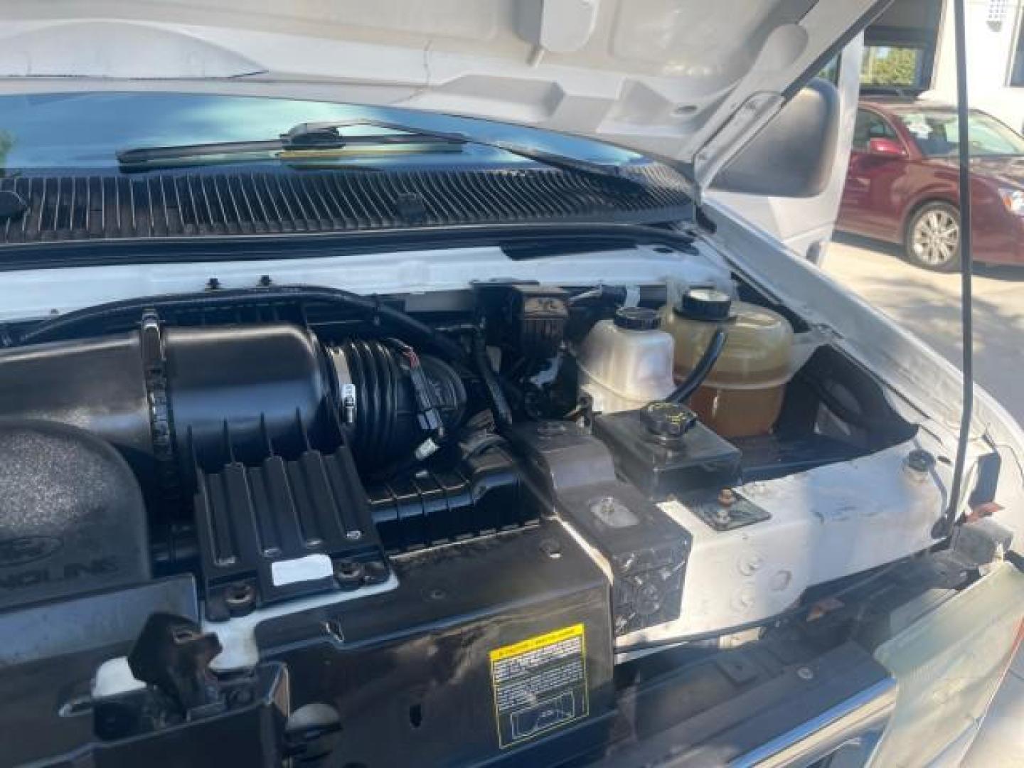 2006 Oxford White /Medium Flint Ford Econoline Wagon XLT LOW MILES 76,474 E350 15 PASS (1FBSS31L36H) with an 5.4L EFI V8 Engine engine, Automatic transmission, located at 4701 North Dixie Hwy, Pompano Beach, FL, 33064, (954) 422-2889, 26.240938, -80.123474 - OUR WEBPAGE FLORIDACARS1.COM HAS OVER 100 PHOTOS AND FREE CARFAX LINK 2006 FORD E-SERIES E-350 SD XLT 15 PASSENGER VAN NEW $29,805 VIN: 1FBSS31L36HA01462 1 F B S S 3 1 L 3 6 H A 0 1 4 6 2 VAN 5.4L V8 F GASOLINE REAR WHEEL DRIVE Features ABS Brakes Air Conditioning AM/FM Stereo Automatic Transmission - Photo#26