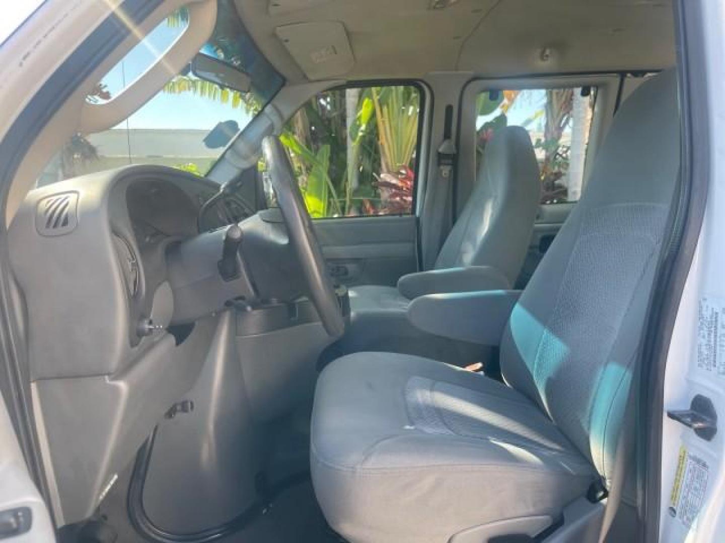 2006 Oxford White /Medium Flint Ford Econoline Wagon XLT LOW MILES 76,474 E350 15 PASS (1FBSS31L36H) with an 5.4L EFI V8 Engine engine, Automatic transmission, located at 4701 North Dixie Hwy, Pompano Beach, FL, 33064, (954) 422-2889, 26.240938, -80.123474 - OUR WEBPAGE FLORIDACARS1.COM HAS OVER 100 PHOTOS AND FREE CARFAX LINK 2006 FORD E-SERIES E-350 SD XLT 15 PASSENGER VAN NEW $29,805 VIN: 1FBSS31L36HA01462 1 F B S S 3 1 L 3 6 H A 0 1 4 6 2 VAN 5.4L V8 F GASOLINE REAR WHEEL DRIVE Features ABS Brakes Air Conditioning AM/FM Stereo Automatic Transmission - Photo#44