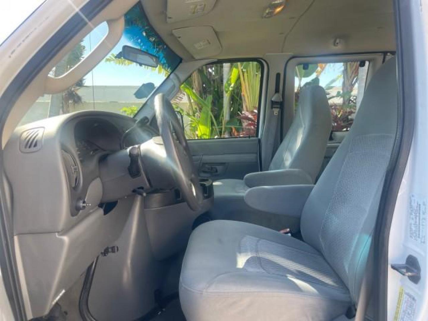 2006 Oxford White /Medium Flint Ford Econoline Wagon XLT LOW MILES 76,474 E350 15 PASS (1FBSS31L36H) with an 5.4L EFI V8 Engine engine, Automatic transmission, located at 4701 North Dixie Hwy, Pompano Beach, FL, 33064, (954) 422-2889, 26.240938, -80.123474 - OUR WEBPAGE FLORIDACARS1.COM HAS OVER 100 PHOTOS AND FREE CARFAX LINK 2006 FORD E-SERIES E-350 SD XLT 15 PASSENGER VAN NEW $29,805 VIN: 1FBSS31L36HA01462 1 F B S S 3 1 L 3 6 H A 0 1 4 6 2 VAN 5.4L V8 F GASOLINE REAR WHEEL DRIVE Features ABS Brakes Air Conditioning AM/FM Stereo Automatic Transmission - Photo#45