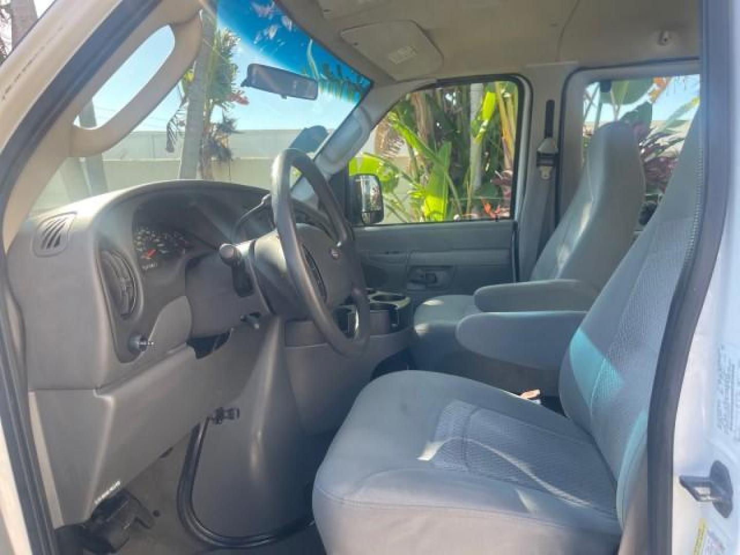 2006 Oxford White /Medium Flint Ford Econoline Wagon XLT LOW MILES 76,474 E350 15 PASS (1FBSS31L36H) with an 5.4L EFI V8 Engine engine, Automatic transmission, located at 4701 North Dixie Hwy, Pompano Beach, FL, 33064, (954) 422-2889, 26.240938, -80.123474 - OUR WEBPAGE FLORIDACARS1.COM HAS OVER 100 PHOTOS AND FREE CARFAX LINK 2006 FORD E-SERIES E-350 SD XLT 15 PASSENGER VAN NEW $29,805 VIN: 1FBSS31L36HA01462 1 F B S S 3 1 L 3 6 H A 0 1 4 6 2 VAN 5.4L V8 F GASOLINE REAR WHEEL DRIVE Features ABS Brakes Air Conditioning AM/FM Stereo Automatic Transmission - Photo#46