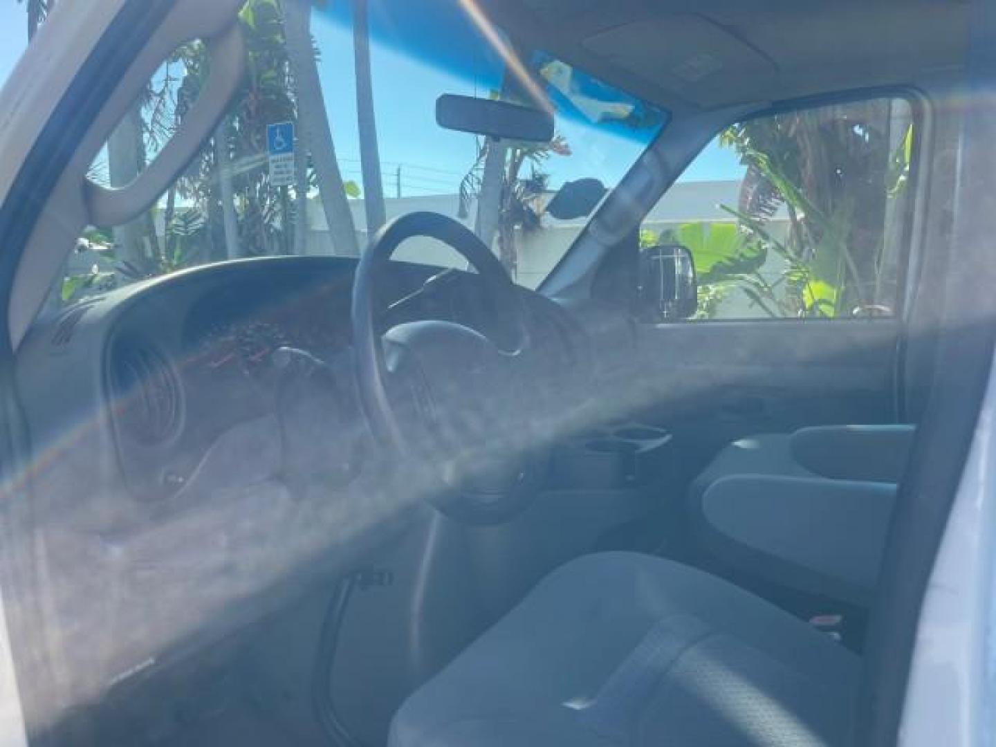 2006 Oxford White /Medium Flint Ford Econoline Wagon XLT LOW MILES 76,474 E350 15 PASS (1FBSS31L36H) with an 5.4L EFI V8 Engine engine, Automatic transmission, located at 4701 North Dixie Hwy, Pompano Beach, FL, 33064, (954) 422-2889, 26.240938, -80.123474 - OUR WEBPAGE FLORIDACARS1.COM HAS OVER 100 PHOTOS AND FREE CARFAX LINK 2006 FORD E-SERIES E-350 SD XLT 15 PASSENGER VAN NEW $29,805 VIN: 1FBSS31L36HA01462 1 F B S S 3 1 L 3 6 H A 0 1 4 6 2 VAN 5.4L V8 F GASOLINE REAR WHEEL DRIVE Features ABS Brakes Air Conditioning AM/FM Stereo Automatic Transmission - Photo#47