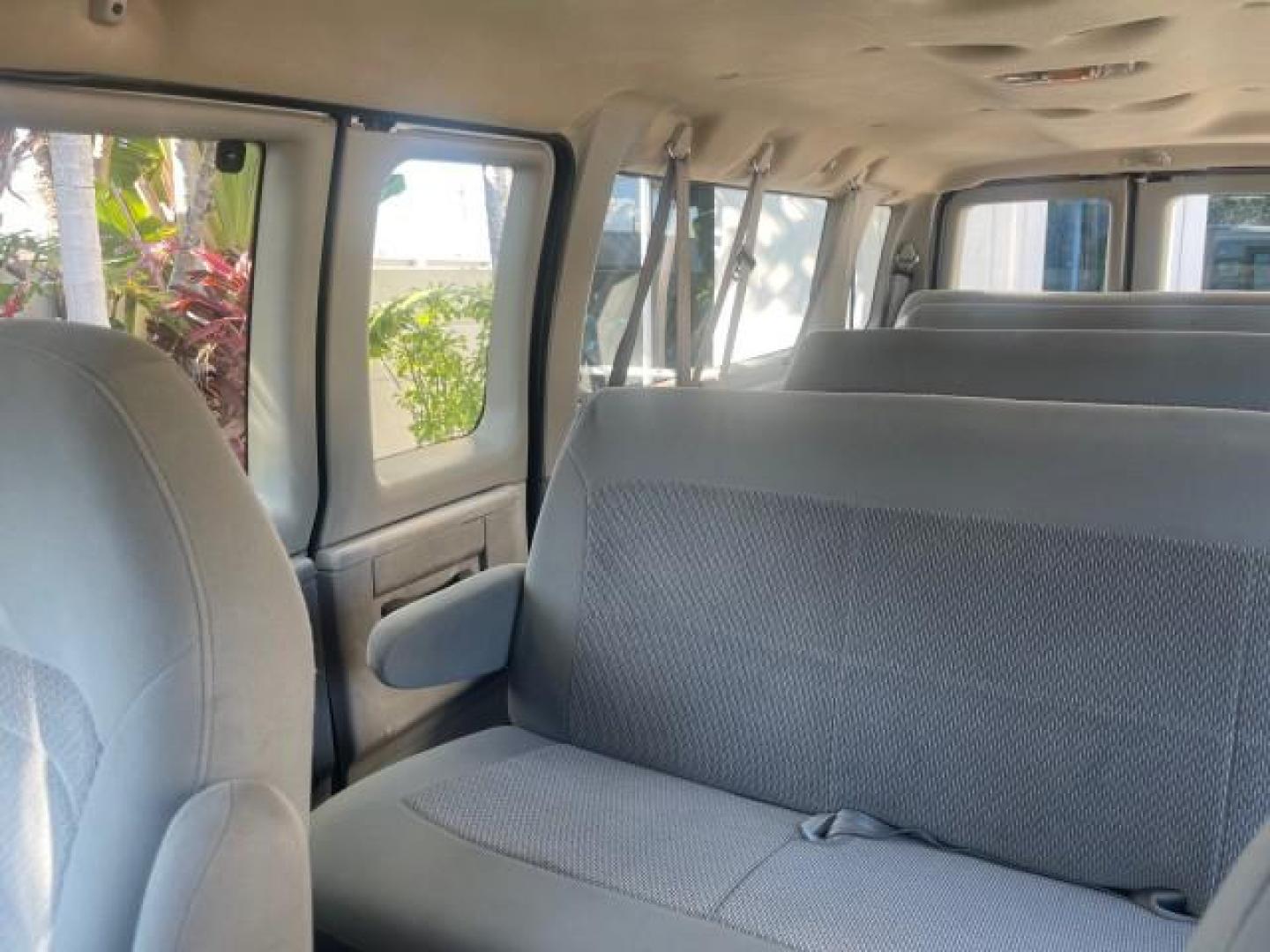 2006 Oxford White /Medium Flint Ford Econoline Wagon XLT LOW MILES 76,474 E350 15 PASS (1FBSS31L36H) with an 5.4L EFI V8 Engine engine, Automatic transmission, located at 4701 North Dixie Hwy, Pompano Beach, FL, 33064, (954) 422-2889, 26.240938, -80.123474 - OUR WEBPAGE FLORIDACARS1.COM HAS OVER 100 PHOTOS AND FREE CARFAX LINK 2006 FORD E-SERIES E-350 SD XLT 15 PASSENGER VAN NEW $29,805 VIN: 1FBSS31L36HA01462 1 F B S S 3 1 L 3 6 H A 0 1 4 6 2 VAN 5.4L V8 F GASOLINE REAR WHEEL DRIVE Features ABS Brakes Air Conditioning AM/FM Stereo Automatic Transmission - Photo#64