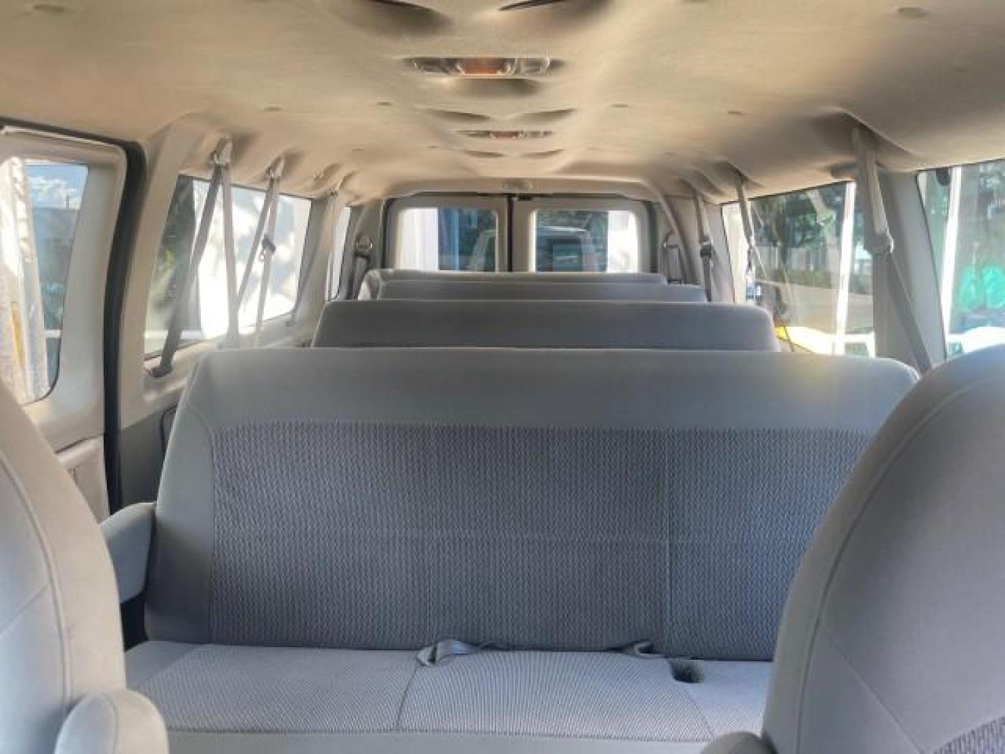 2006 Oxford White /Medium Flint Ford Econoline Wagon XLT LOW MILES 76,474 E350 15 PASS (1FBSS31L36H) with an 5.4L EFI V8 Engine engine, Automatic transmission, located at 4701 North Dixie Hwy, Pompano Beach, FL, 33064, (954) 422-2889, 26.240938, -80.123474 - OUR WEBPAGE FLORIDACARS1.COM HAS OVER 100 PHOTOS AND FREE CARFAX LINK 2006 FORD E-SERIES E-350 SD XLT 15 PASSENGER VAN NEW $29,805 VIN: 1FBSS31L36HA01462 1 F B S S 3 1 L 3 6 H A 0 1 4 6 2 VAN 5.4L V8 F GASOLINE REAR WHEEL DRIVE Features ABS Brakes Air Conditioning AM/FM Stereo Automatic Transmission - Photo#65