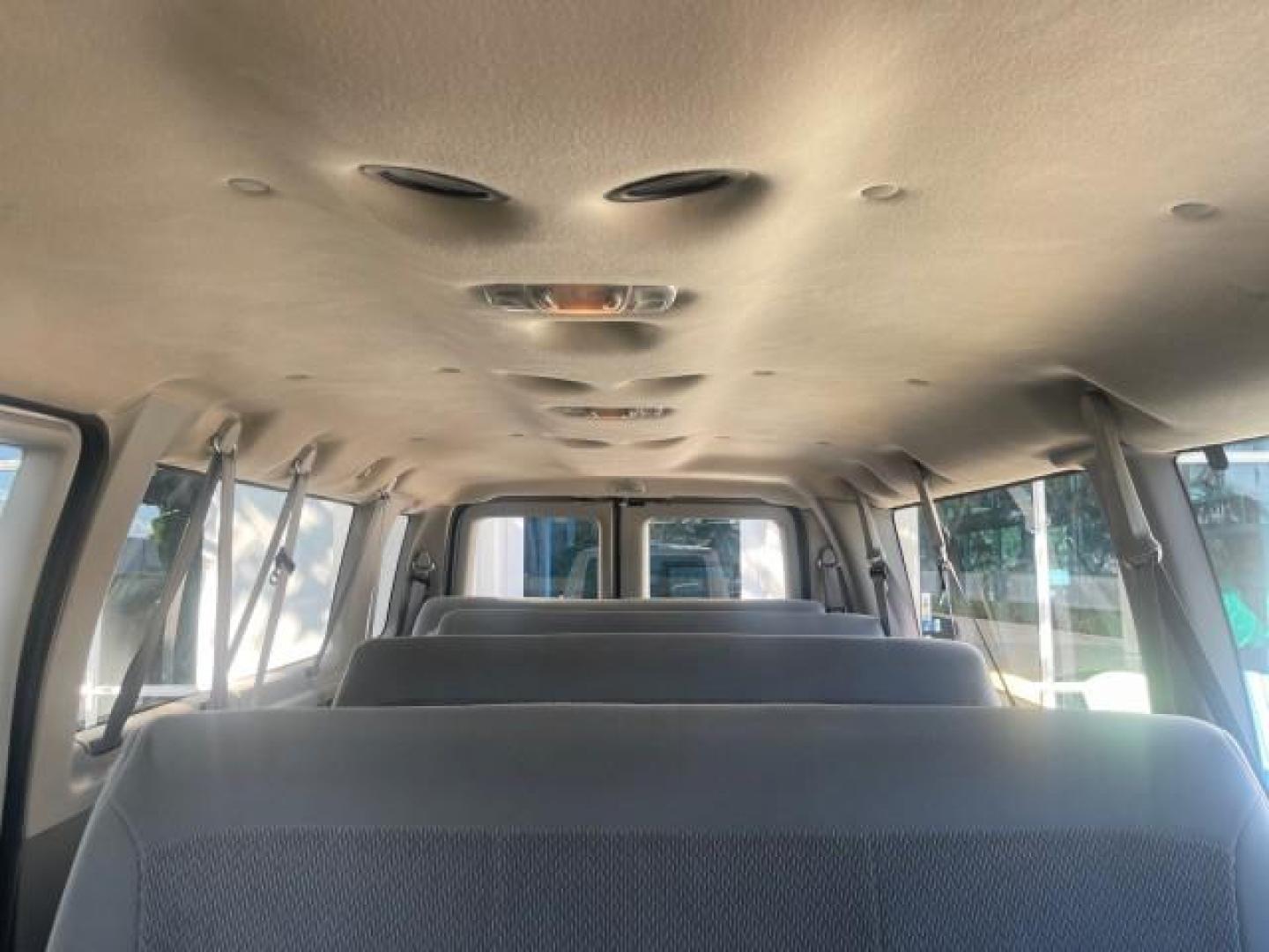 2006 Oxford White /Medium Flint Ford Econoline Wagon XLT LOW MILES 76,474 E350 15 PASS (1FBSS31L36H) with an 5.4L EFI V8 Engine engine, Automatic transmission, located at 4701 North Dixie Hwy, Pompano Beach, FL, 33064, (954) 422-2889, 26.240938, -80.123474 - OUR WEBPAGE FLORIDACARS1.COM HAS OVER 100 PHOTOS AND FREE CARFAX LINK 2006 FORD E-SERIES E-350 SD XLT 15 PASSENGER VAN NEW $29,805 VIN: 1FBSS31L36HA01462 1 F B S S 3 1 L 3 6 H A 0 1 4 6 2 VAN 5.4L V8 F GASOLINE REAR WHEEL DRIVE Features ABS Brakes Air Conditioning AM/FM Stereo Automatic Transmission - Photo#66