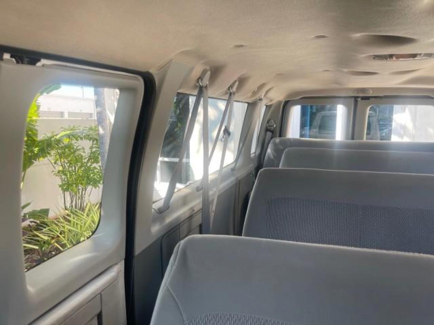 2006 Oxford White /Medium Flint Ford Econoline Wagon XLT LOW MILES 76,474 E350 15 PASS (1FBSS31L36H) with an 5.4L EFI V8 Engine engine, Automatic transmission, located at 4701 North Dixie Hwy, Pompano Beach, FL, 33064, (954) 422-2889, 26.240938, -80.123474 - OUR WEBPAGE FLORIDACARS1.COM HAS OVER 100 PHOTOS AND FREE CARFAX LINK 2006 FORD E-SERIES E-350 SD XLT 15 PASSENGER VAN NEW $29,805 VIN: 1FBSS31L36HA01462 1 F B S S 3 1 L 3 6 H A 0 1 4 6 2 VAN 5.4L V8 F GASOLINE REAR WHEEL DRIVE Features ABS Brakes Air Conditioning AM/FM Stereo Automatic Transmission - Photo#67