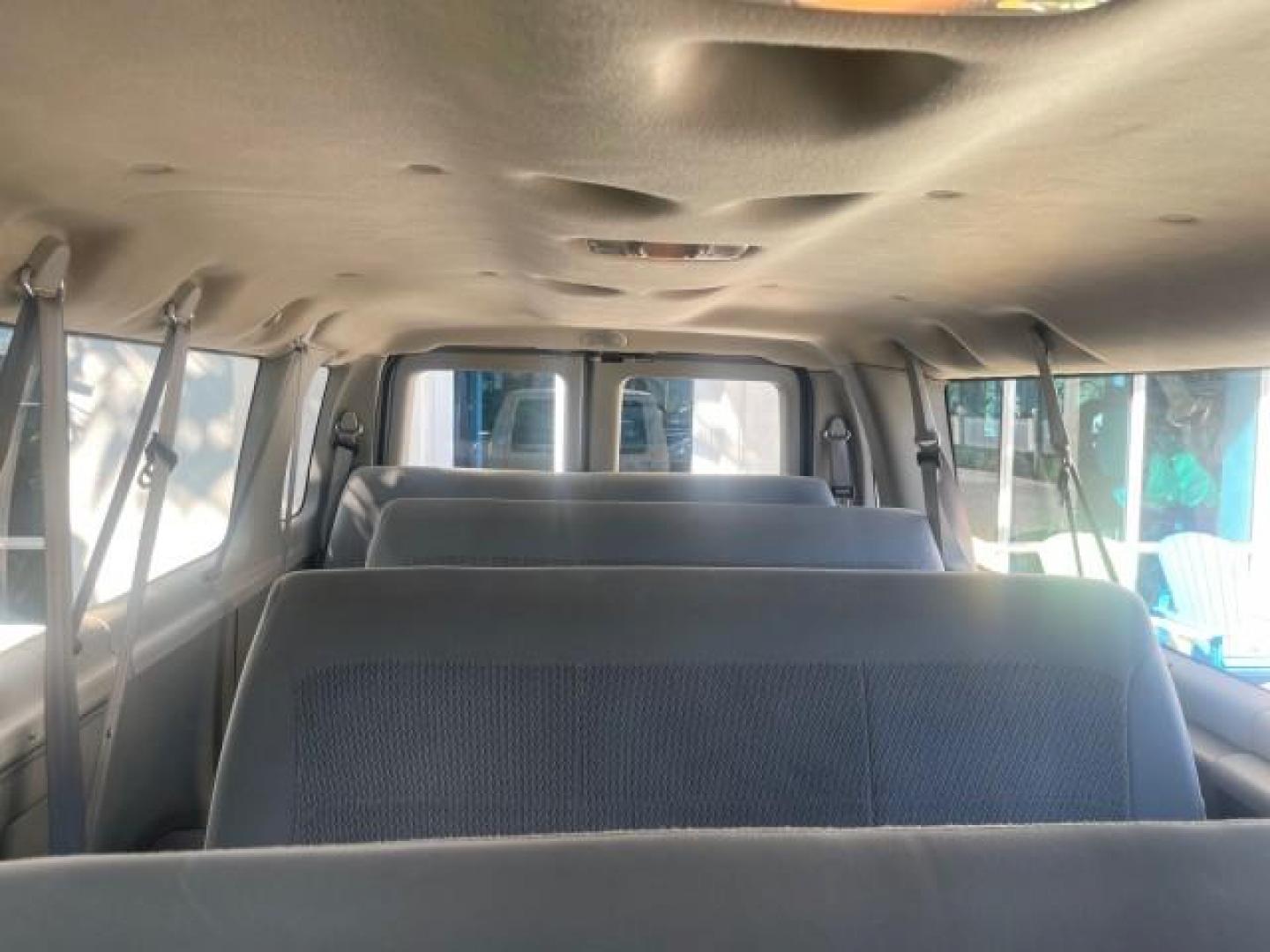 2006 Oxford White /Medium Flint Ford Econoline Wagon XLT LOW MILES 76,474 E350 15 PASS (1FBSS31L36H) with an 5.4L EFI V8 Engine engine, Automatic transmission, located at 4701 North Dixie Hwy, Pompano Beach, FL, 33064, (954) 422-2889, 26.240938, -80.123474 - OUR WEBPAGE FLORIDACARS1.COM HAS OVER 100 PHOTOS AND FREE CARFAX LINK 2006 FORD E-SERIES E-350 SD XLT 15 PASSENGER VAN NEW $29,805 VIN: 1FBSS31L36HA01462 1 F B S S 3 1 L 3 6 H A 0 1 4 6 2 VAN 5.4L V8 F GASOLINE REAR WHEEL DRIVE Features ABS Brakes Air Conditioning AM/FM Stereo Automatic Transmission - Photo#68